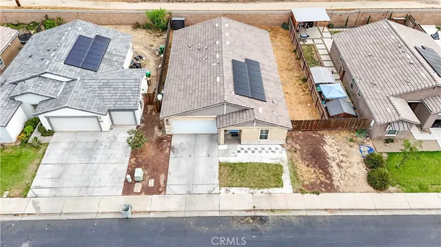 front view of a house with a street