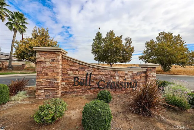 a view of a pathway along the house and lake view