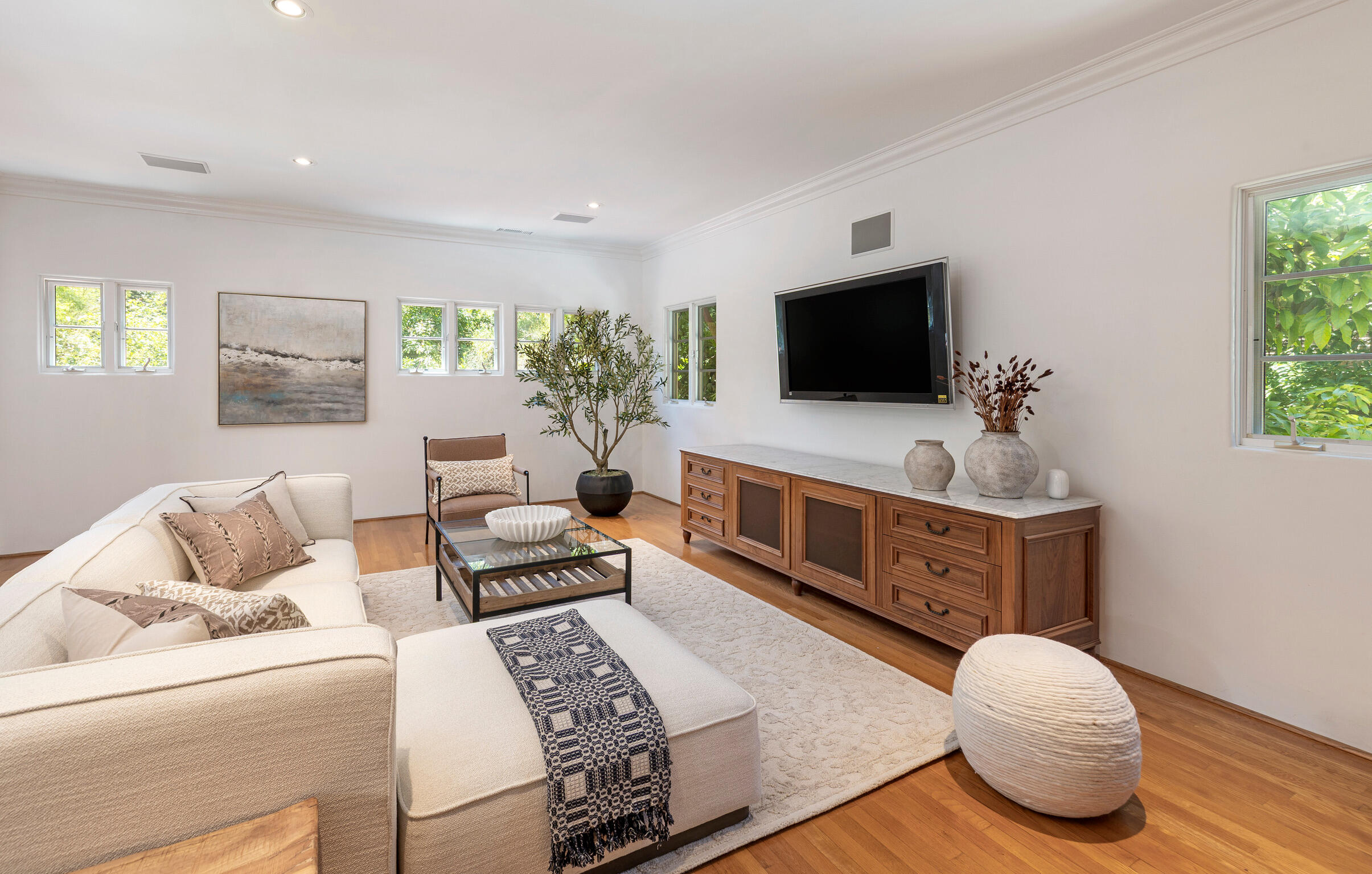 1493 Sycamore Canyon Road Montecito, CA 93108 - Photo 25 of 47 a living room with furniture and a flat screen tv