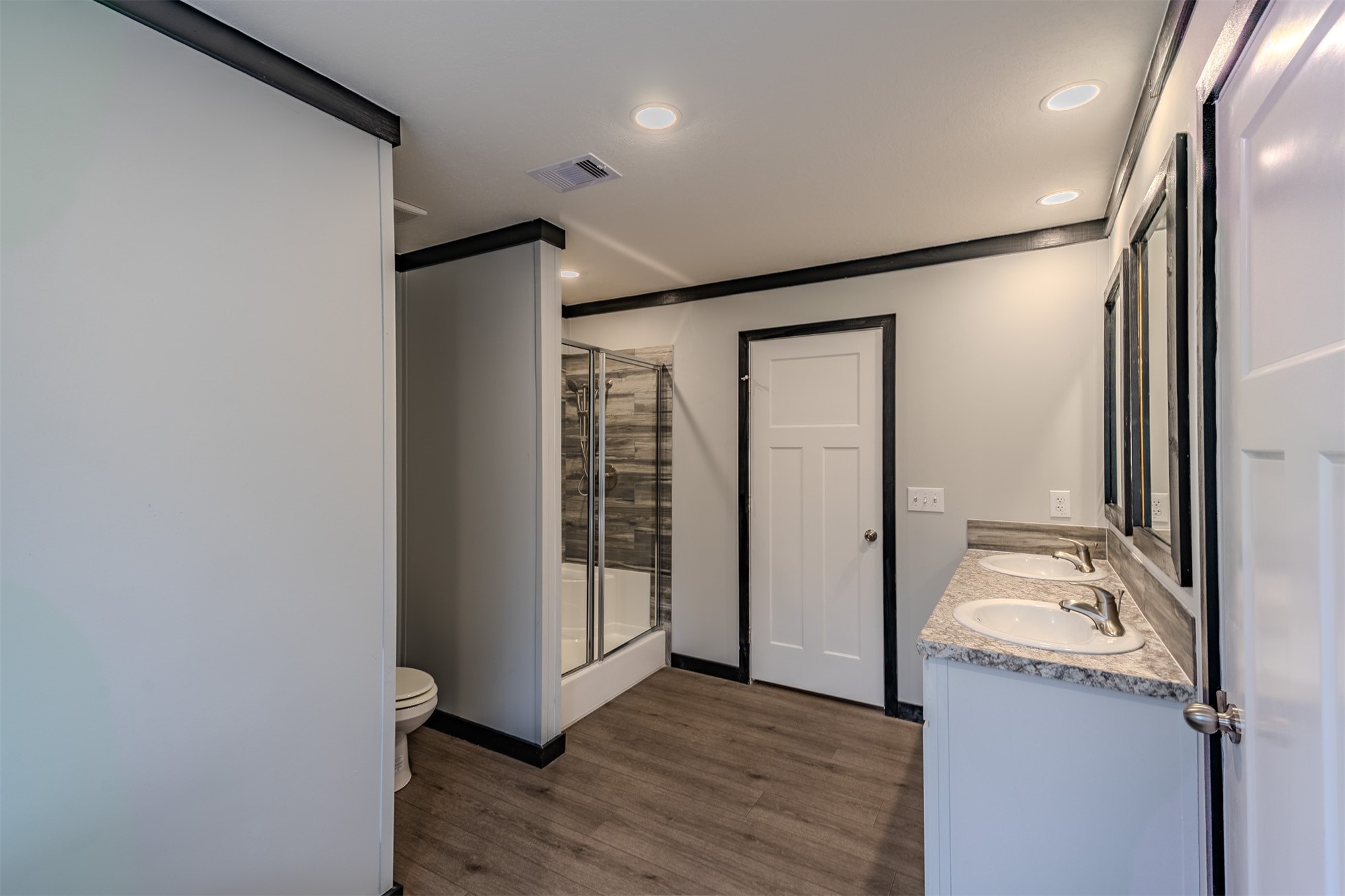 541746 Lem Turner Road Callahan, FL 32011 - Photo 15 of 25 a bathroom with a granite countertop sink and a mirror