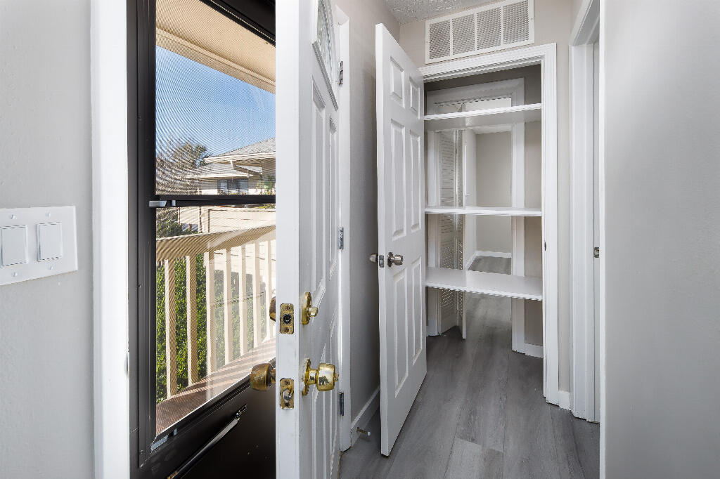 64 Cross Creek Road, Unit 20 Miramar Beach, FL 32550 - Photo 18 of 19 a view of a walk in closet and bedroom