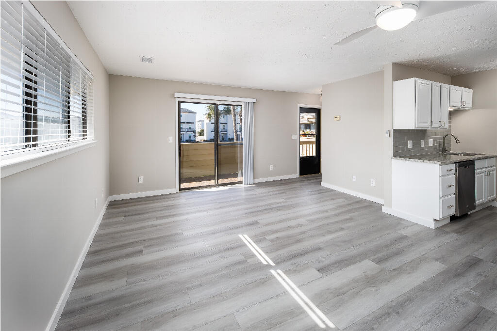 64 Cross Creek Road, Unit 20 Miramar Beach, FL 32550 - Photo 7 of 19 a view of a kitchen with wooden floor and electronic appliances