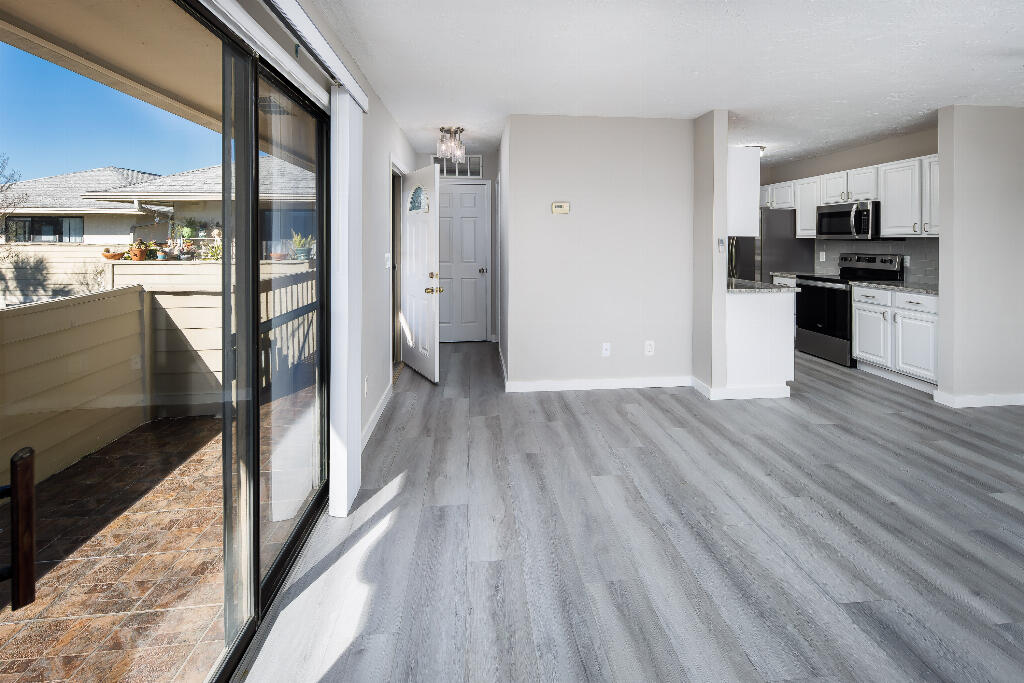 64 Cross Creek Road, Unit 20 Miramar Beach, FL 32550 - Photo 8 of 19 a view of kitchen and wooden floor