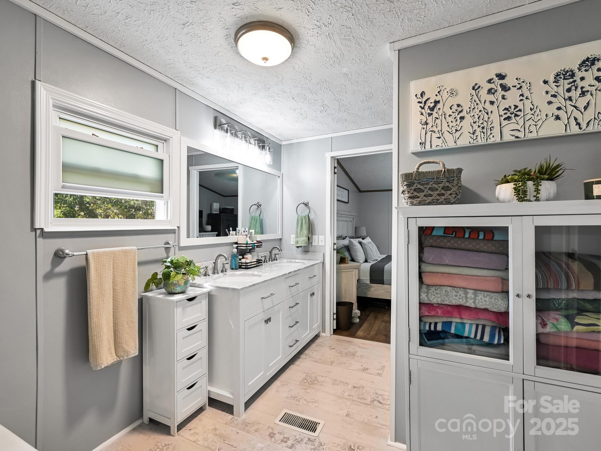 450 Berry Wills Road Hot Springs, NC 28743 - Photo 20 of 48 a room with cabinets and window
