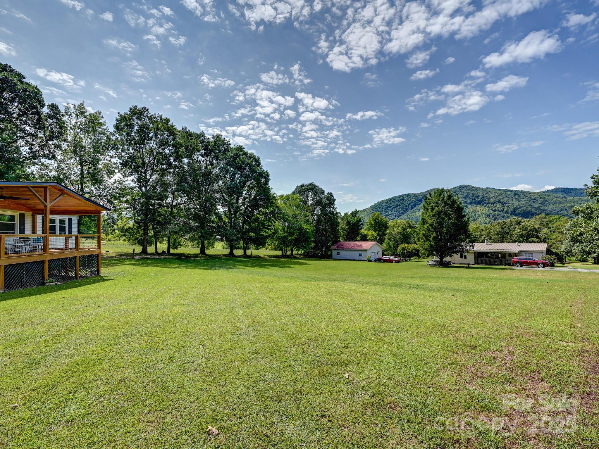450 Berry Wills Road Hot Springs, NC 28743 - Photo 32 of 48 a view of a house with a big yard