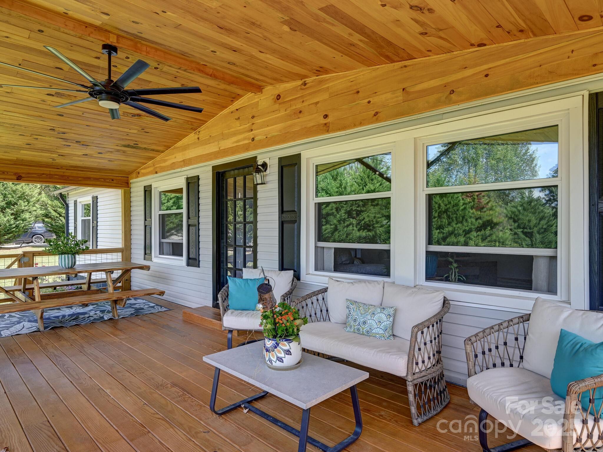450 Berry Wills Road Hot Springs, NC 28743 - Photo 4 of 48 a living room with furniture and a large window
