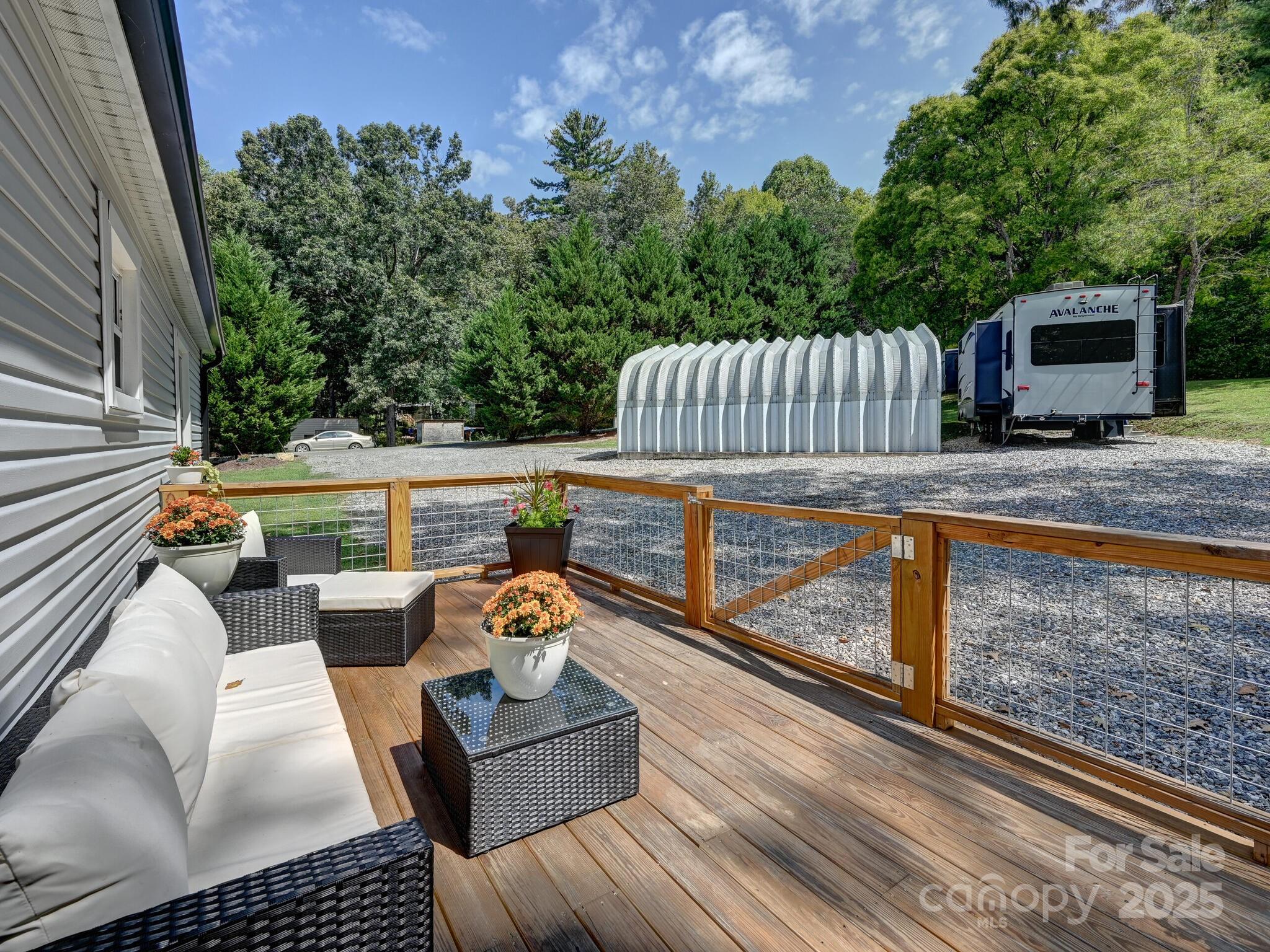 450 Berry Wills Road Hot Springs, NC 28743 - Photo 45 of 48 a view of a couches in the roof deck