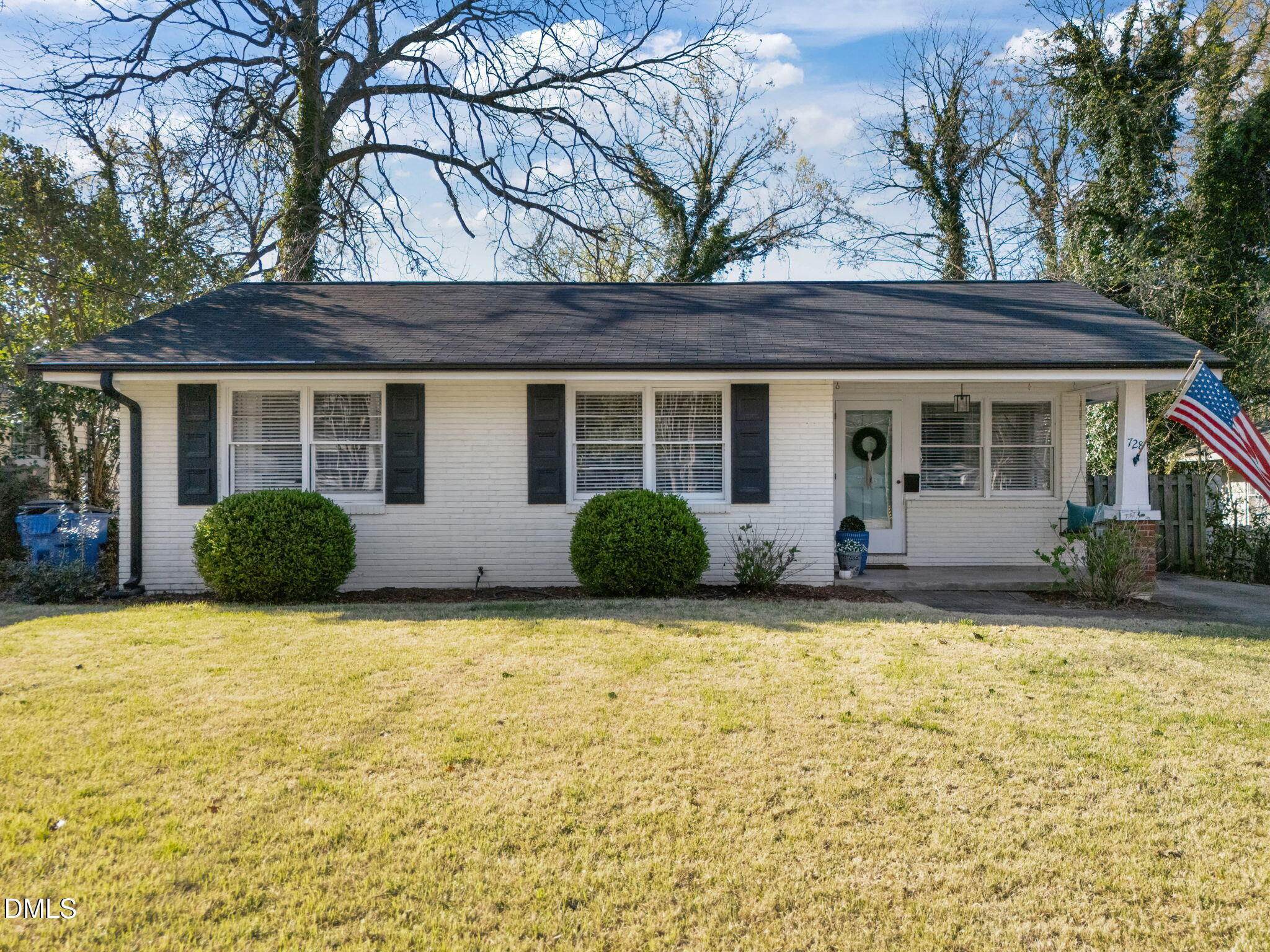 728 East Whitaker Mill Road Raleigh, NC 27608 - Photo 1 of 39 a view of a house with a yard