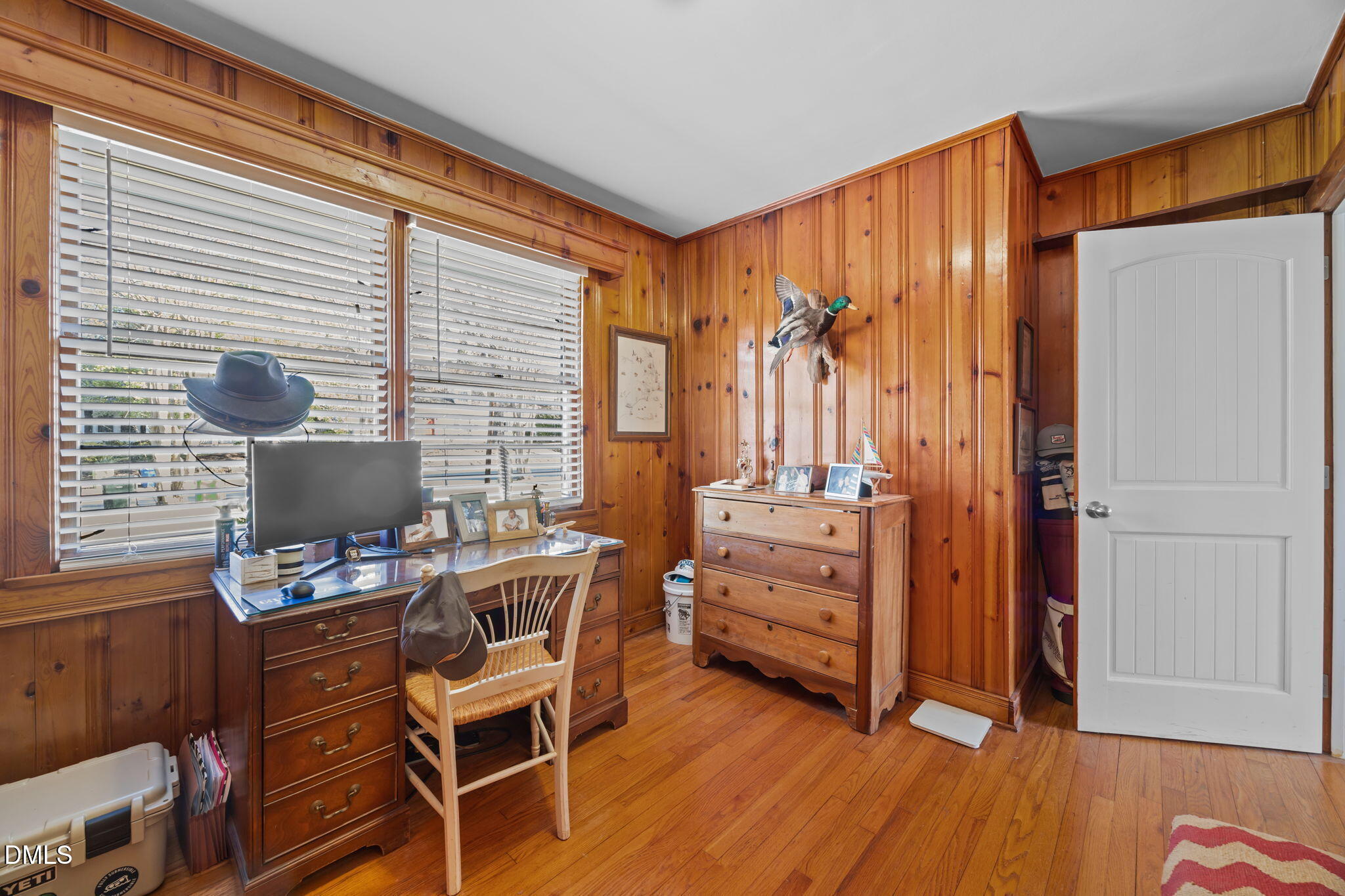 728 East Whitaker Mill Road Raleigh, NC 27608 - Photo 20 of 39 a view of a workspace with furniture and a window