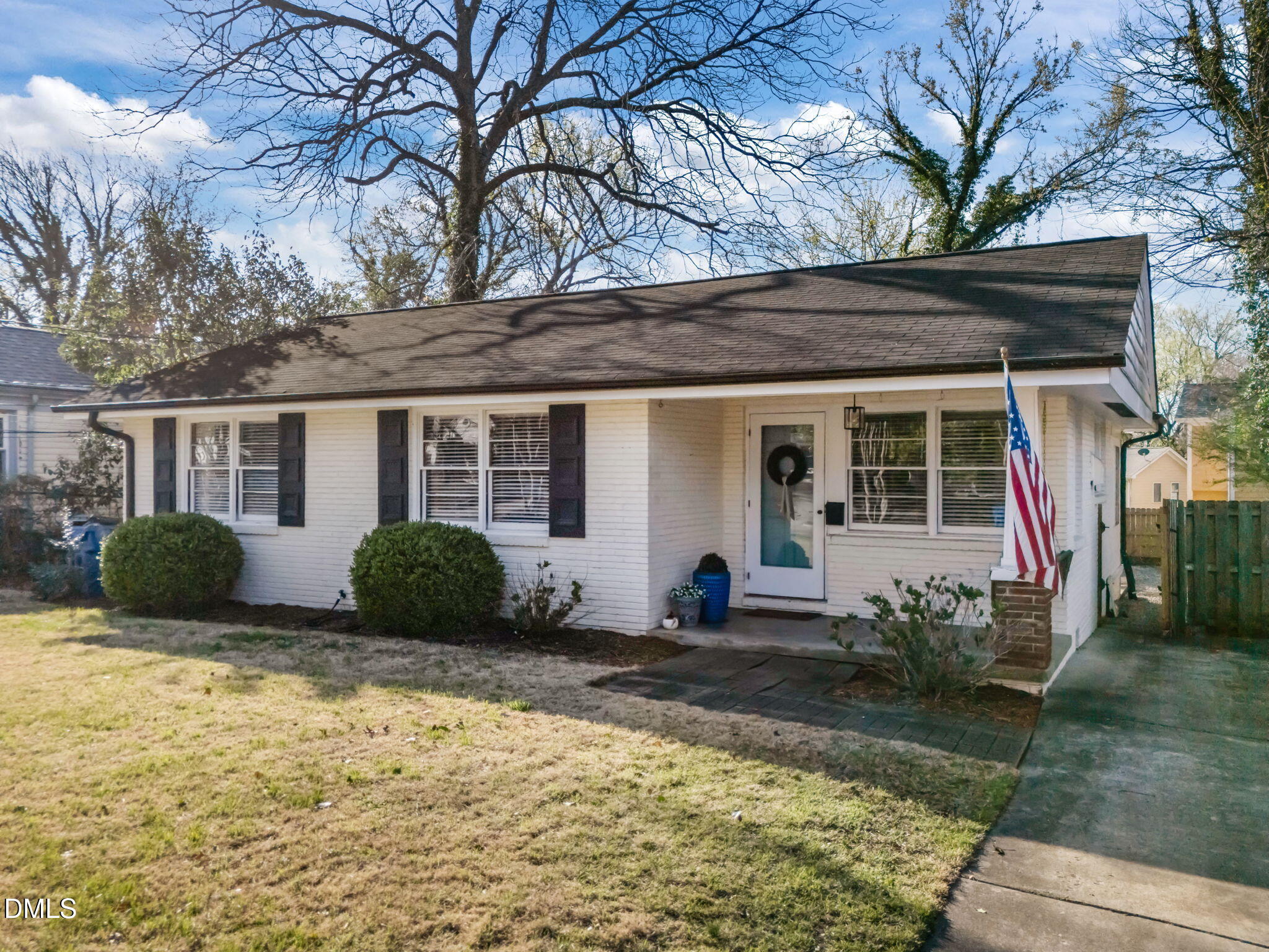 728 East Whitaker Mill Road Raleigh, NC 27608 - Photo 2 of 39 a view of a house with a patio