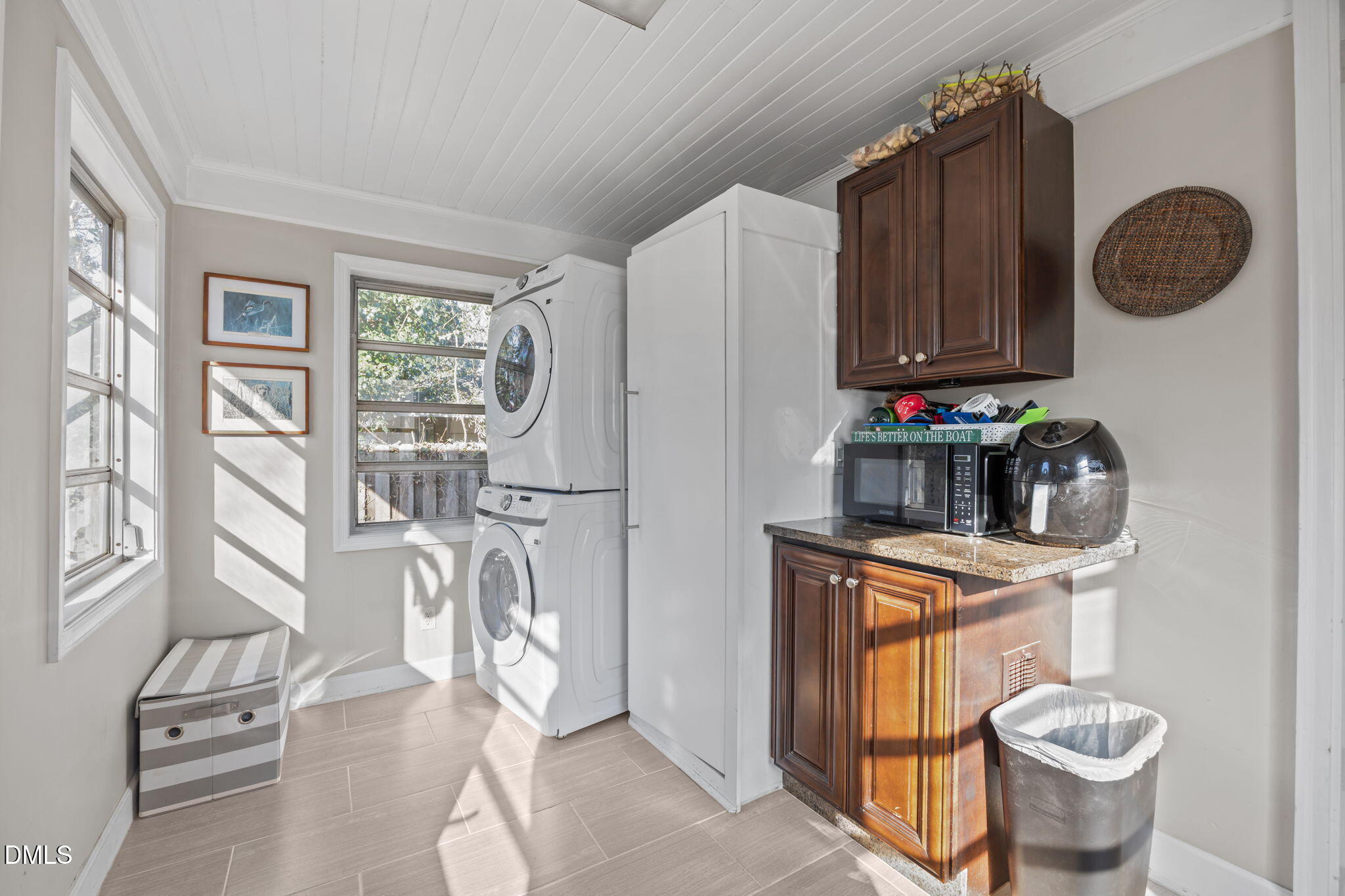 728 East Whitaker Mill Road Raleigh, NC 27608 - Photo 24 of 39 a kitchen with stainless steel appliances granite countertop a sink a stove and a refrigerator