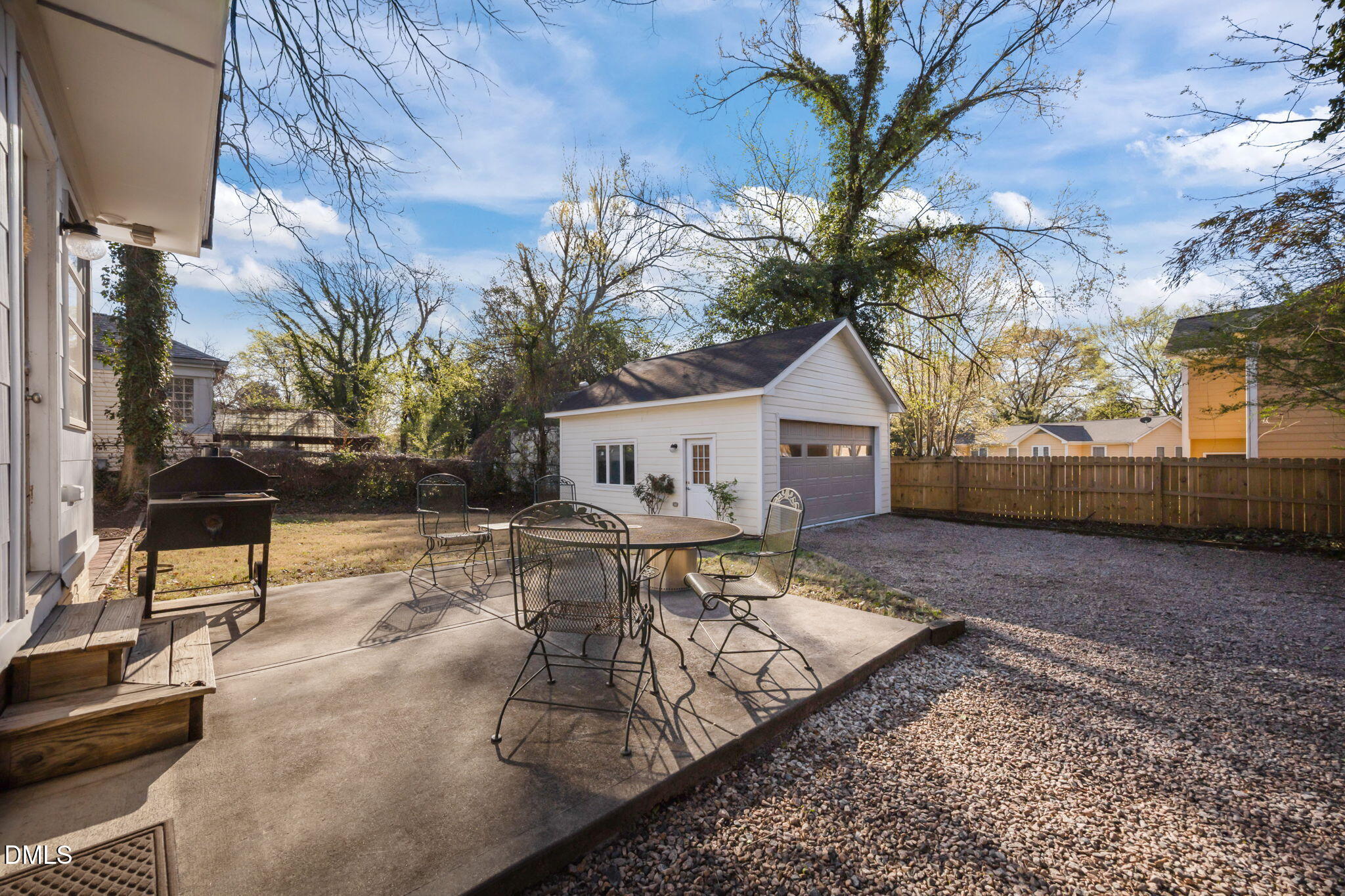 728 East Whitaker Mill Road Raleigh, NC 27608 - Photo 28 of 39 a view of a house with backyard and sitting area