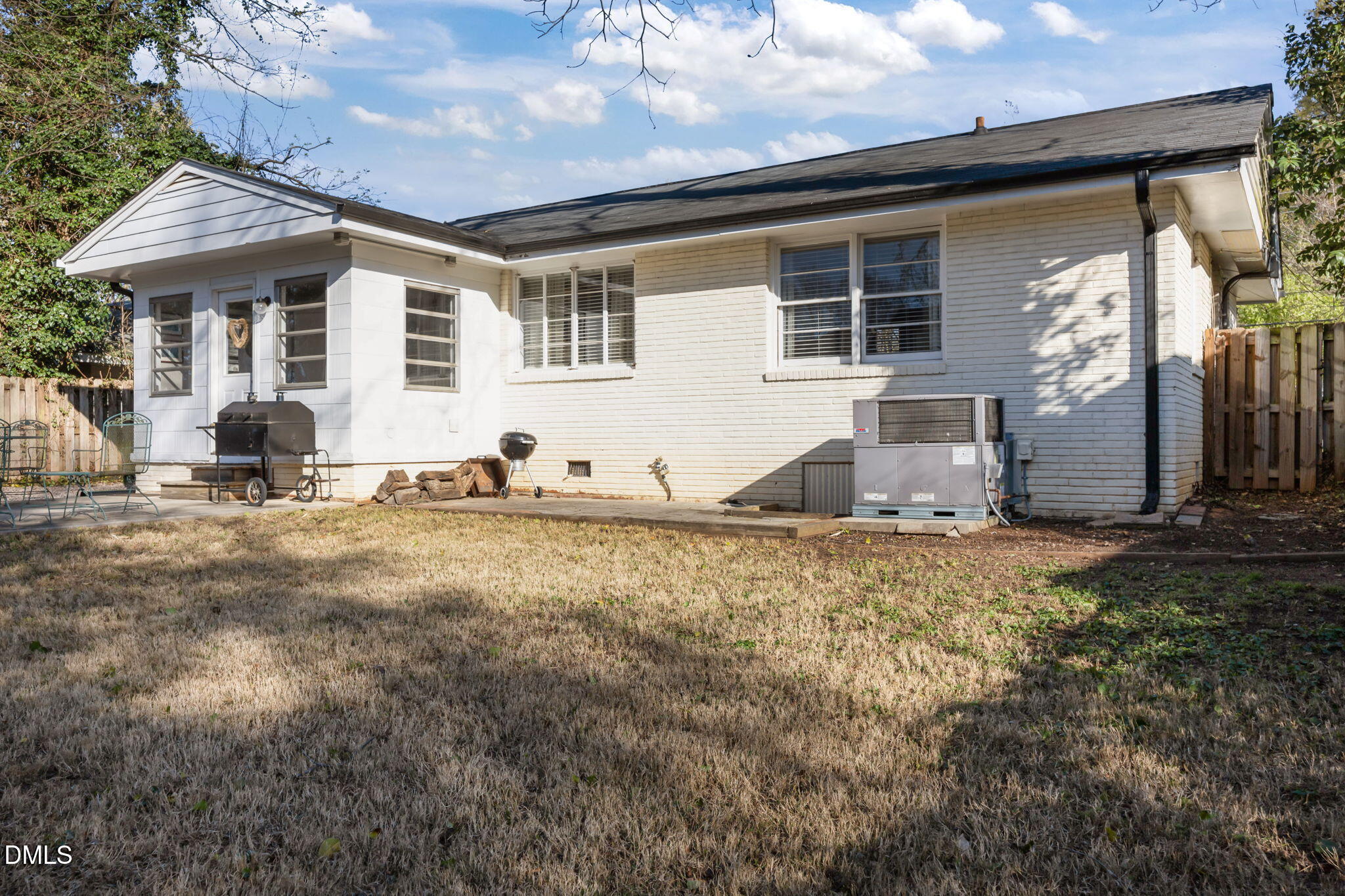 728 East Whitaker Mill Road Raleigh, NC 27608 - Photo 29 of 39 a view of a house with backyard and sitting area