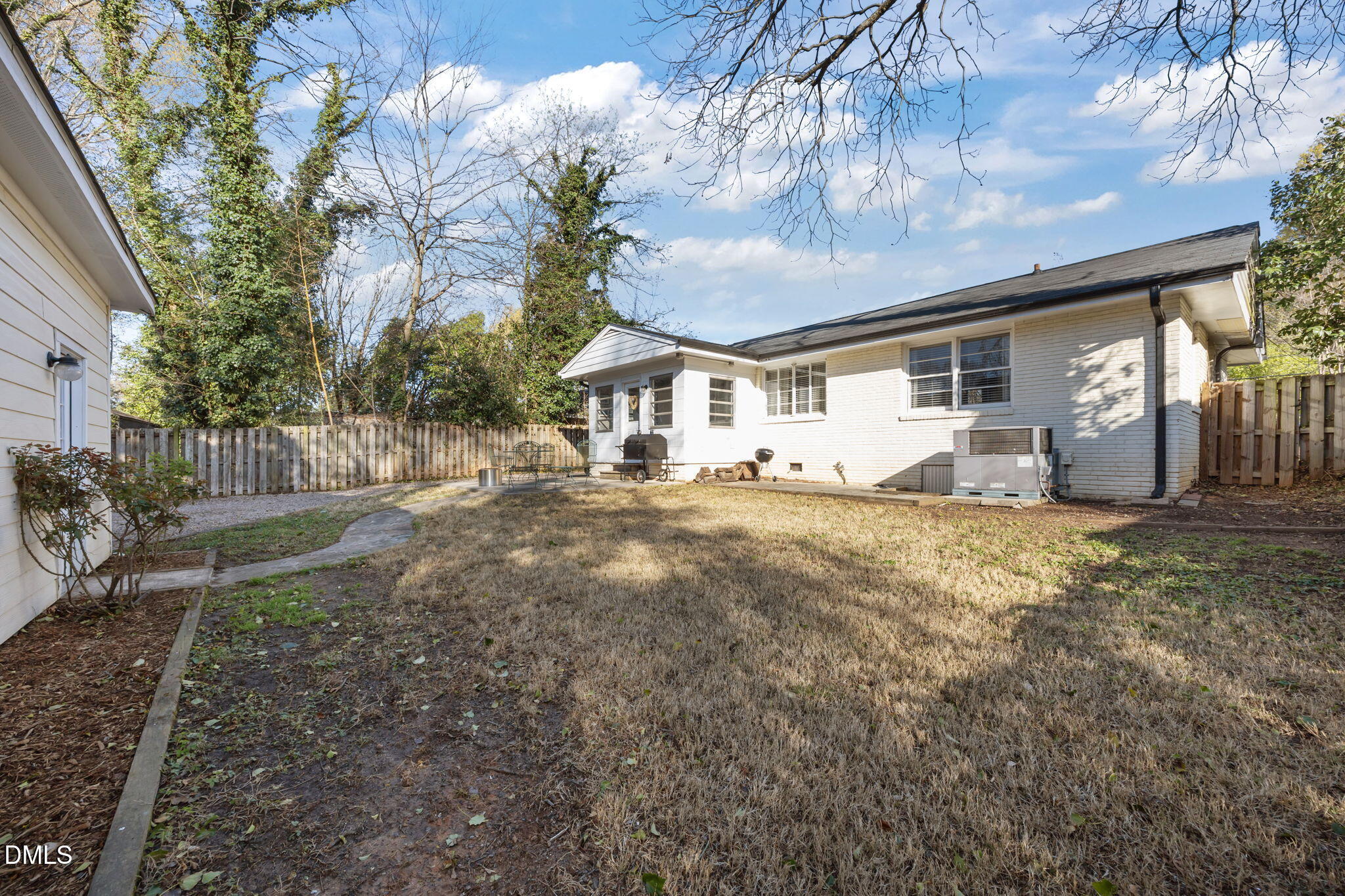 728 East Whitaker Mill Road Raleigh, NC 27608 - Photo 30 of 39 a front view of a house with a yard