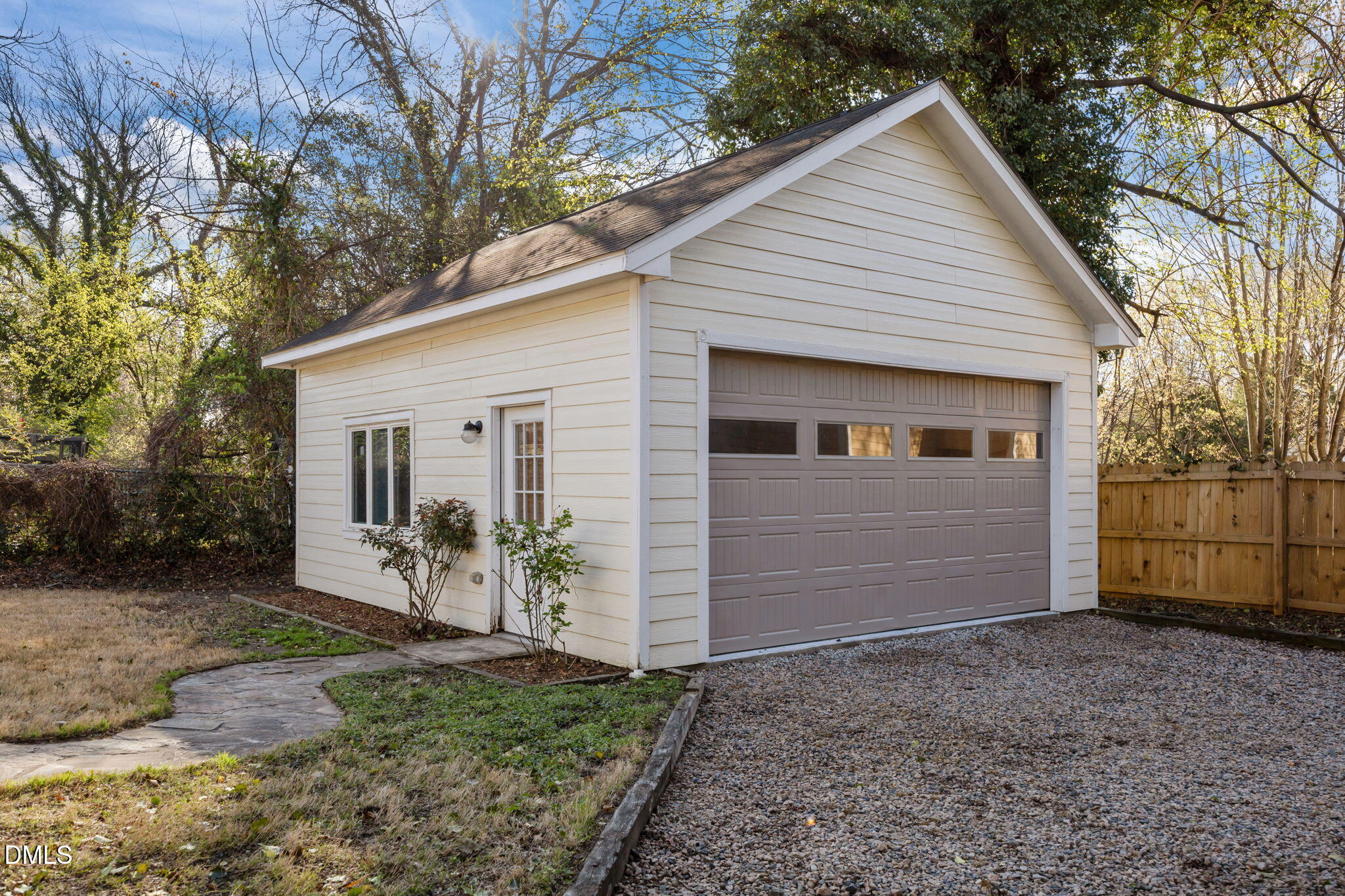 728 East Whitaker Mill Road Raleigh, NC 27608 - Photo 31 of 39 a view of a small house with yard