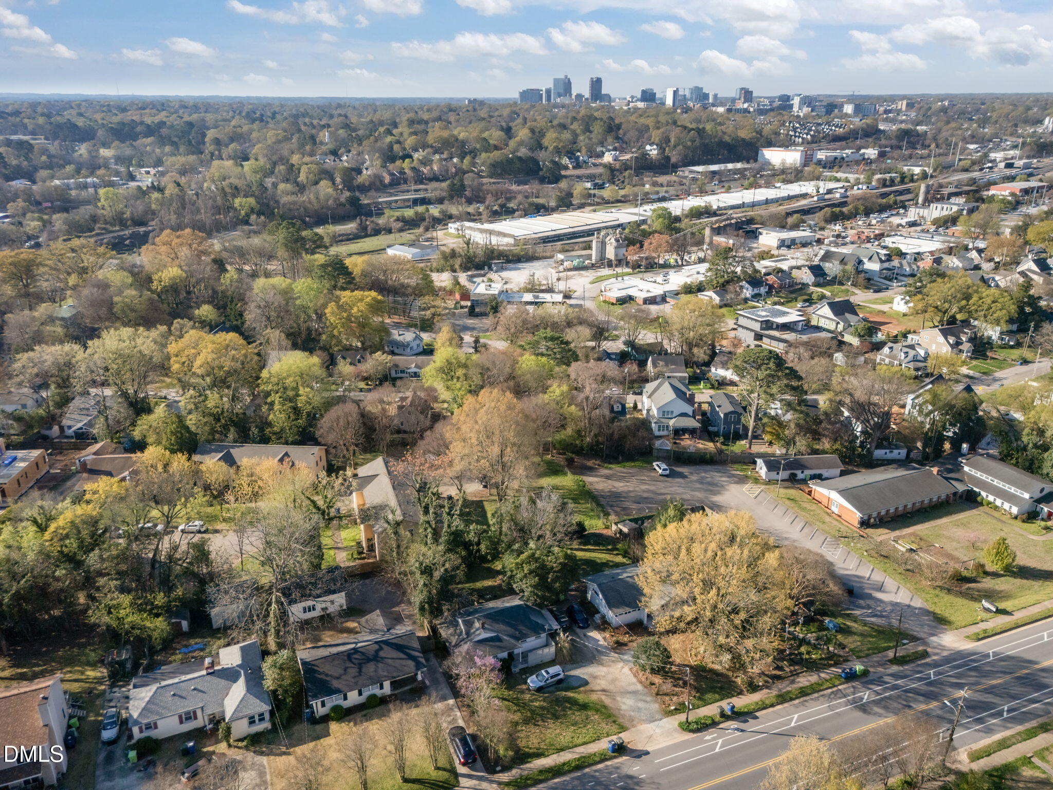 728 East Whitaker Mill Road Raleigh, NC 27608 - Photo 36 of 39 an aerial view of residential houses with outdoor space