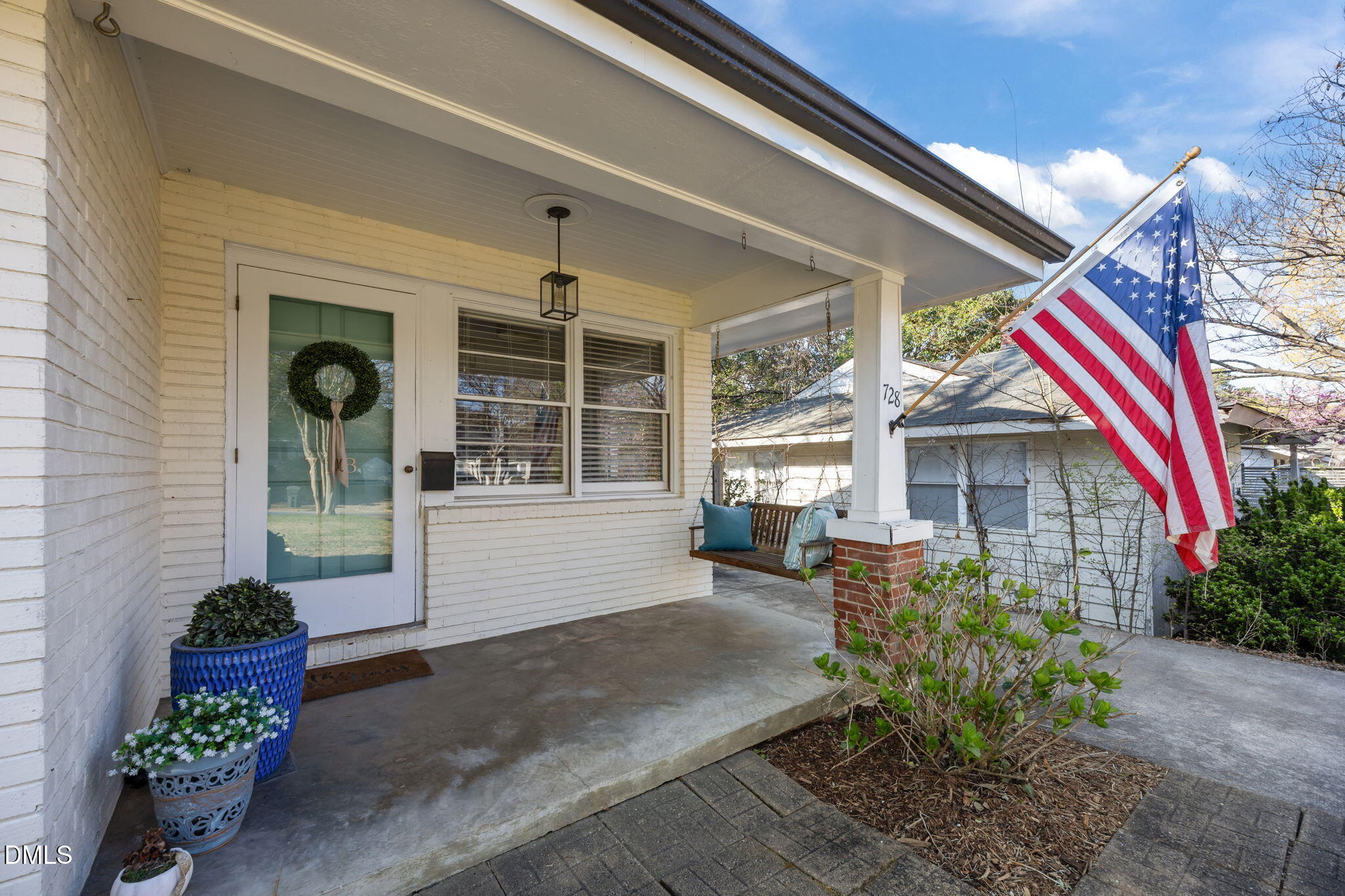 728 East Whitaker Mill Road Raleigh, NC 27608 - Photo 4 of 39 a house view with a outdoor seating