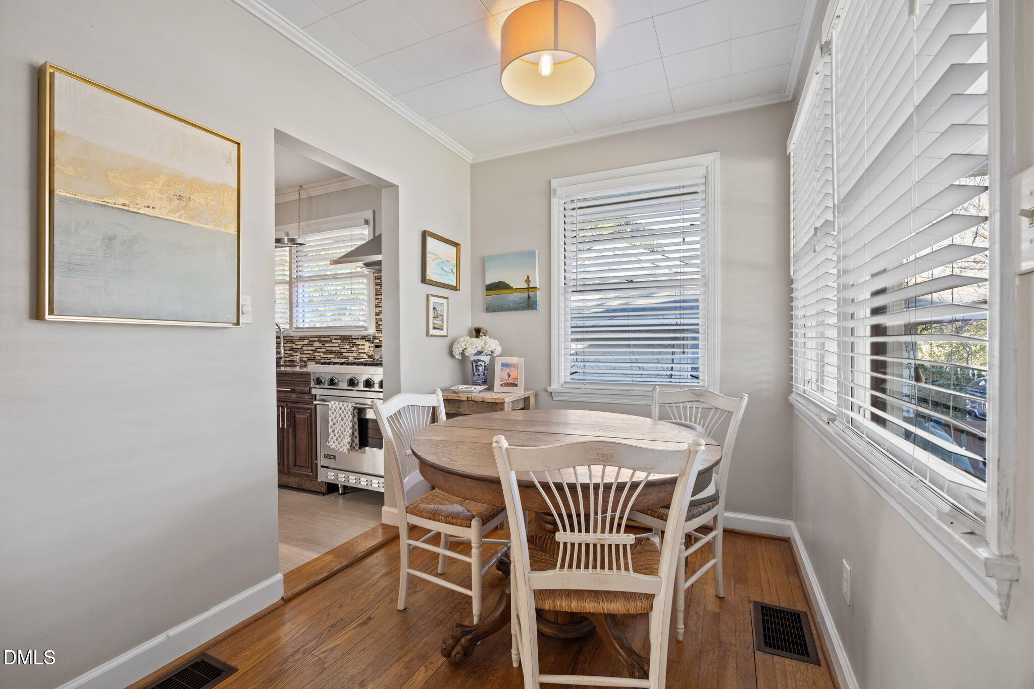 728 East Whitaker Mill Road Raleigh, NC 27608 - Photo 6 of 39 a dining room with furniture and window