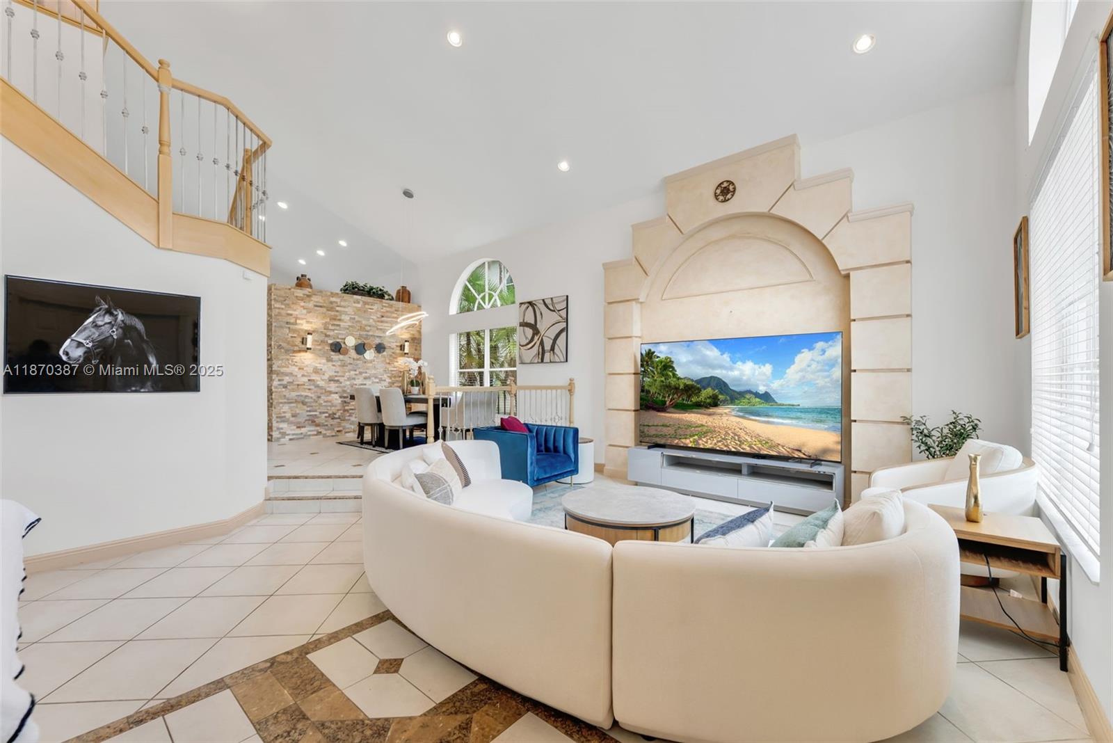17431 Southwest 35th Street Miramar, FL 33029 - Photo 25 of 32 a living room with furniture and a flat screen tv