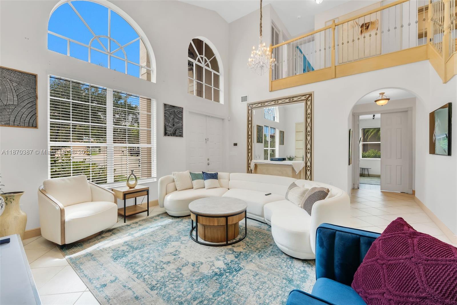 17431 Southwest 35th Street Miramar, FL 33029 - Photo 3 of 32 a living room with furniture and a large window