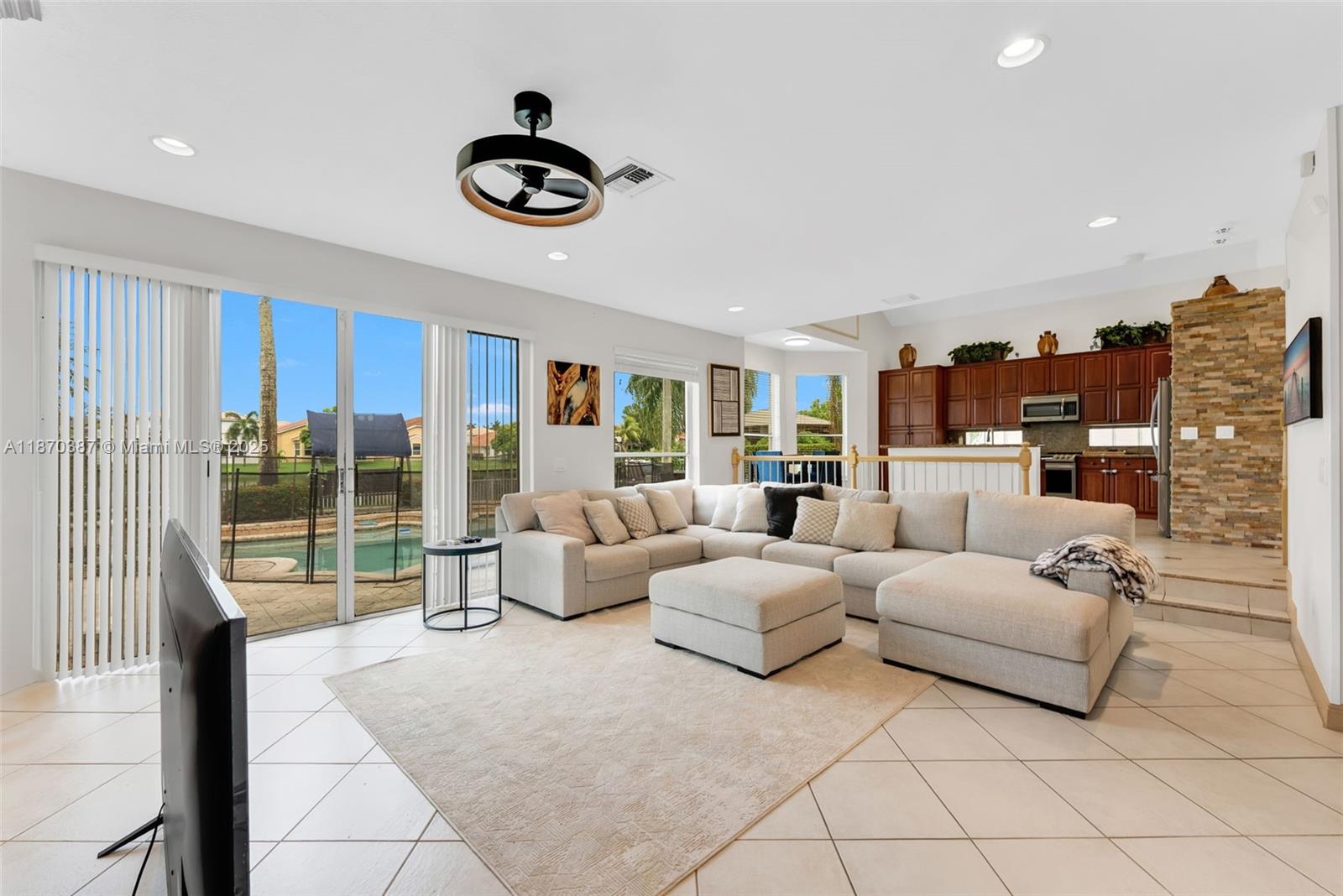 17431 Southwest 35th Street Miramar, FL 33029 - Photo 8 of 32 a living room with furniture and a large window