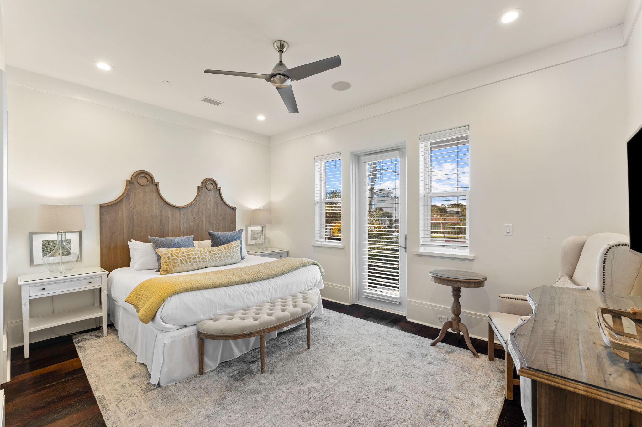 138 West Beach Drive Miramar Beach, FL 32550 - Photo 30 of 72 a bedroom with a bed a desk and chair