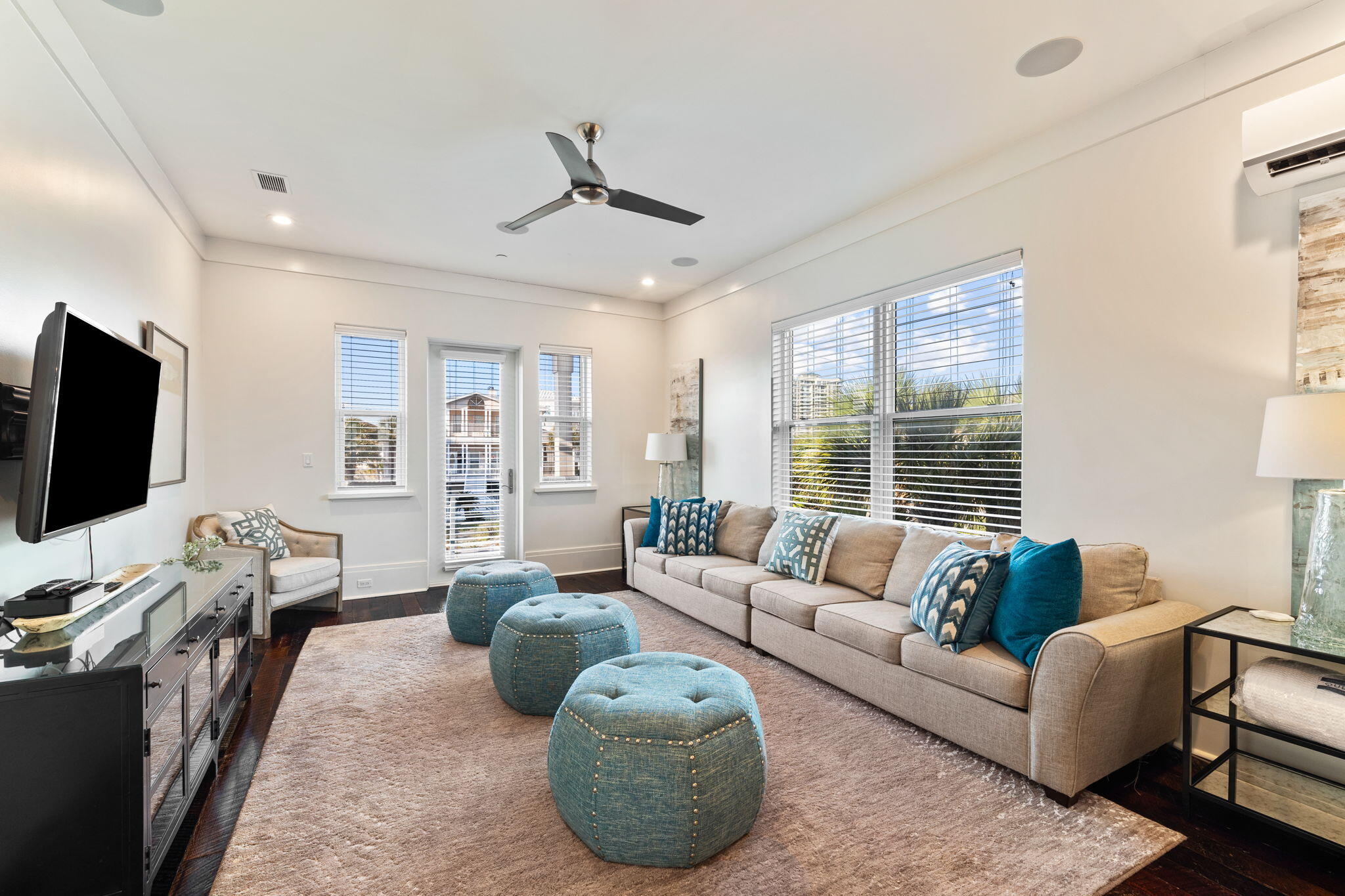138 West Beach Drive Miramar Beach, FL 32550 - Photo 32 of 72 a living room with furniture and a flat screen tv