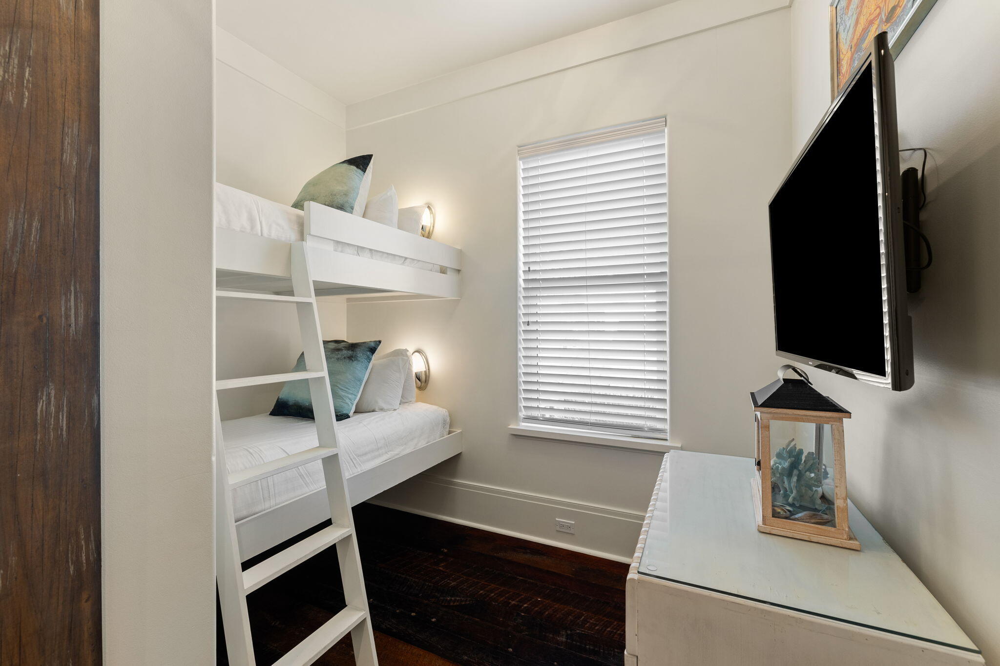 138 West Beach Drive Miramar Beach, FL 32550 - Photo 37 of 72 a room with furniture and a flat screen tv