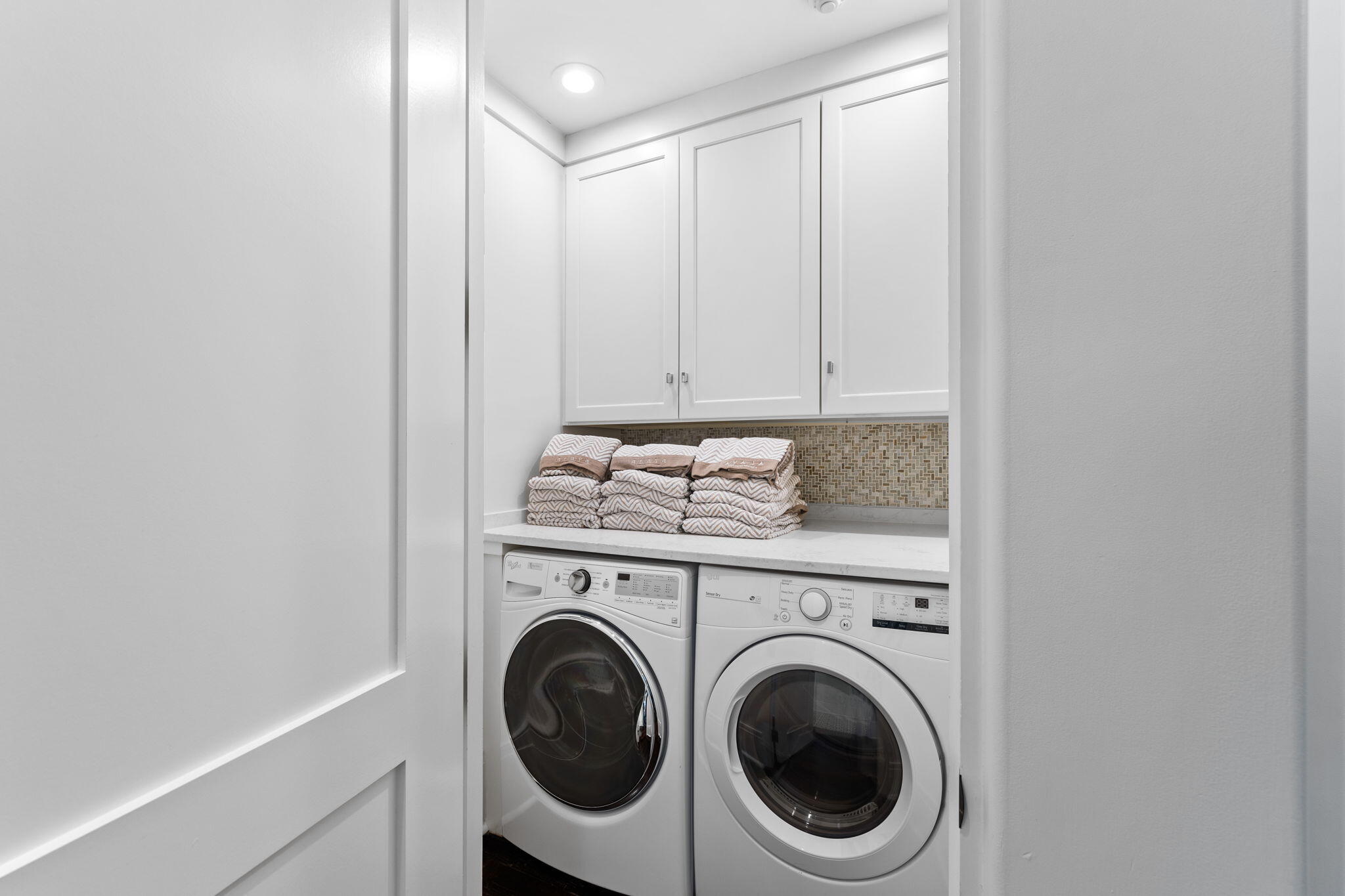 138 West Beach Drive Miramar Beach, FL 32550 - Photo 38 of 72 a utility room with dryer and washer
