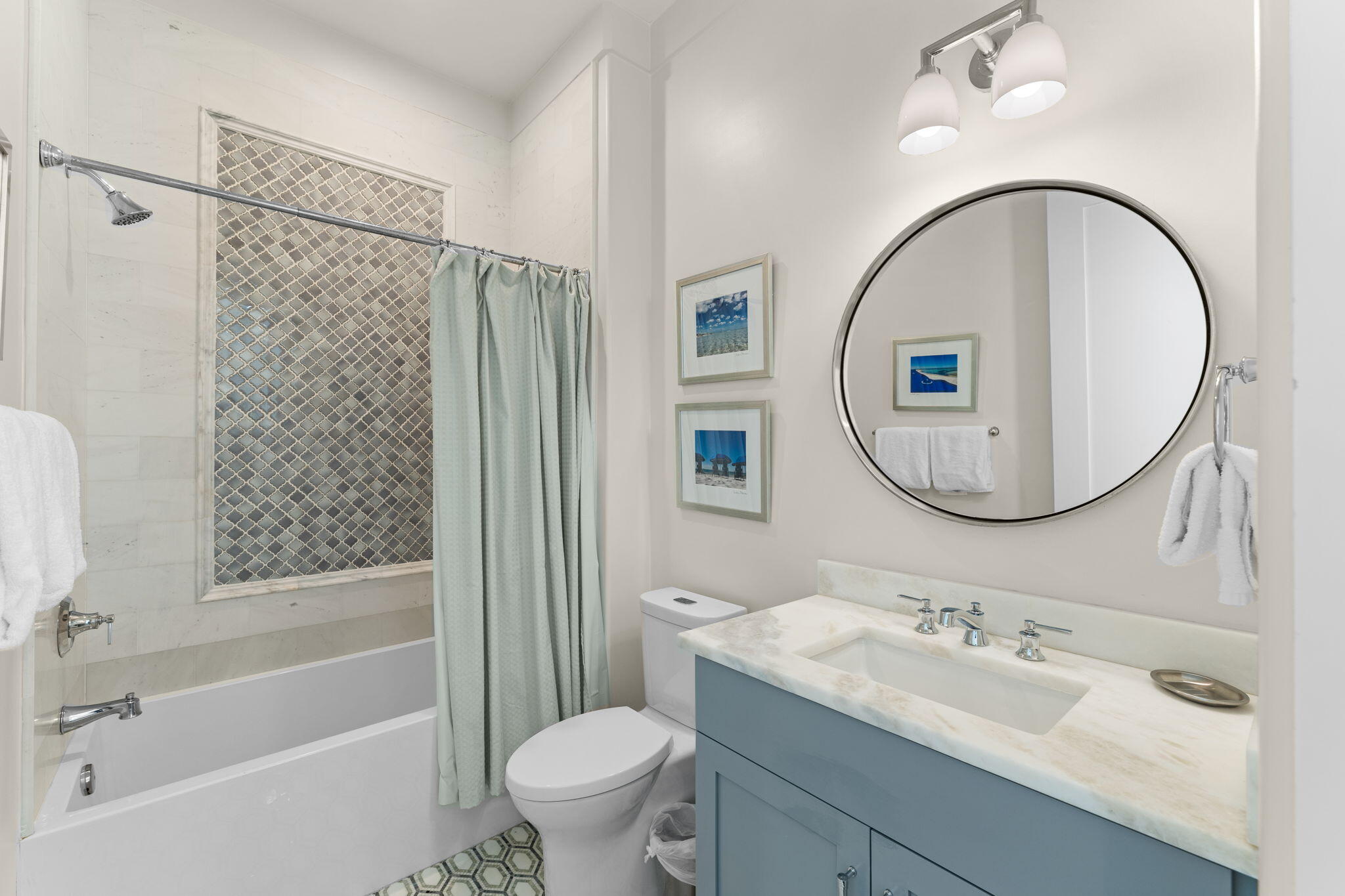 138 West Beach Drive Miramar Beach, FL 32550 - Photo 40 of 72 a bathroom with a sink toilet and shower