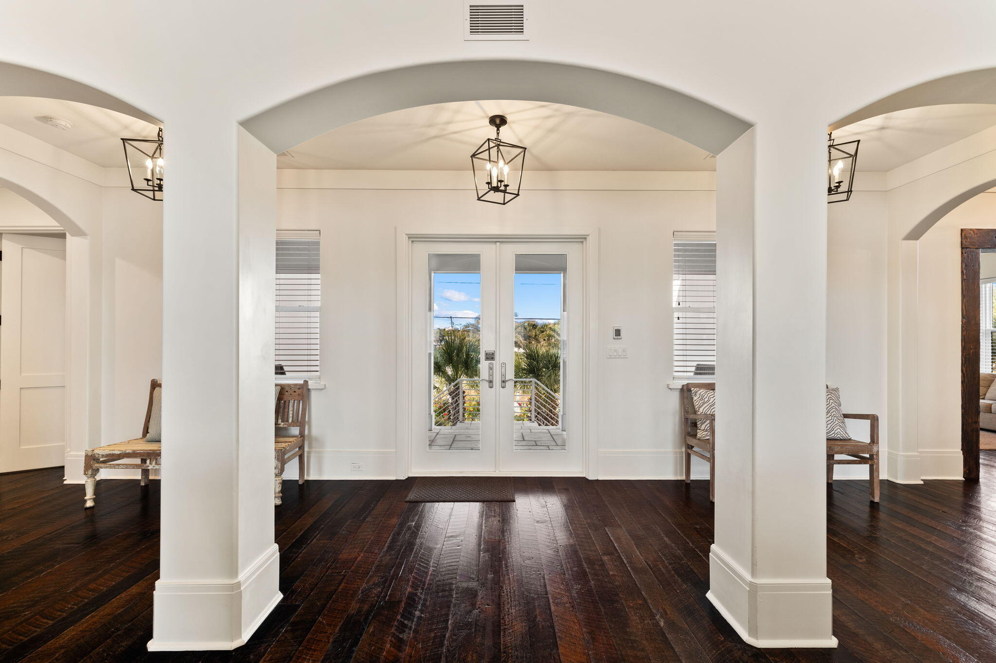 138 West Beach Drive Miramar Beach, FL 32550 - Photo 6 of 72 a view of a hallway view with wooden floor and staircase