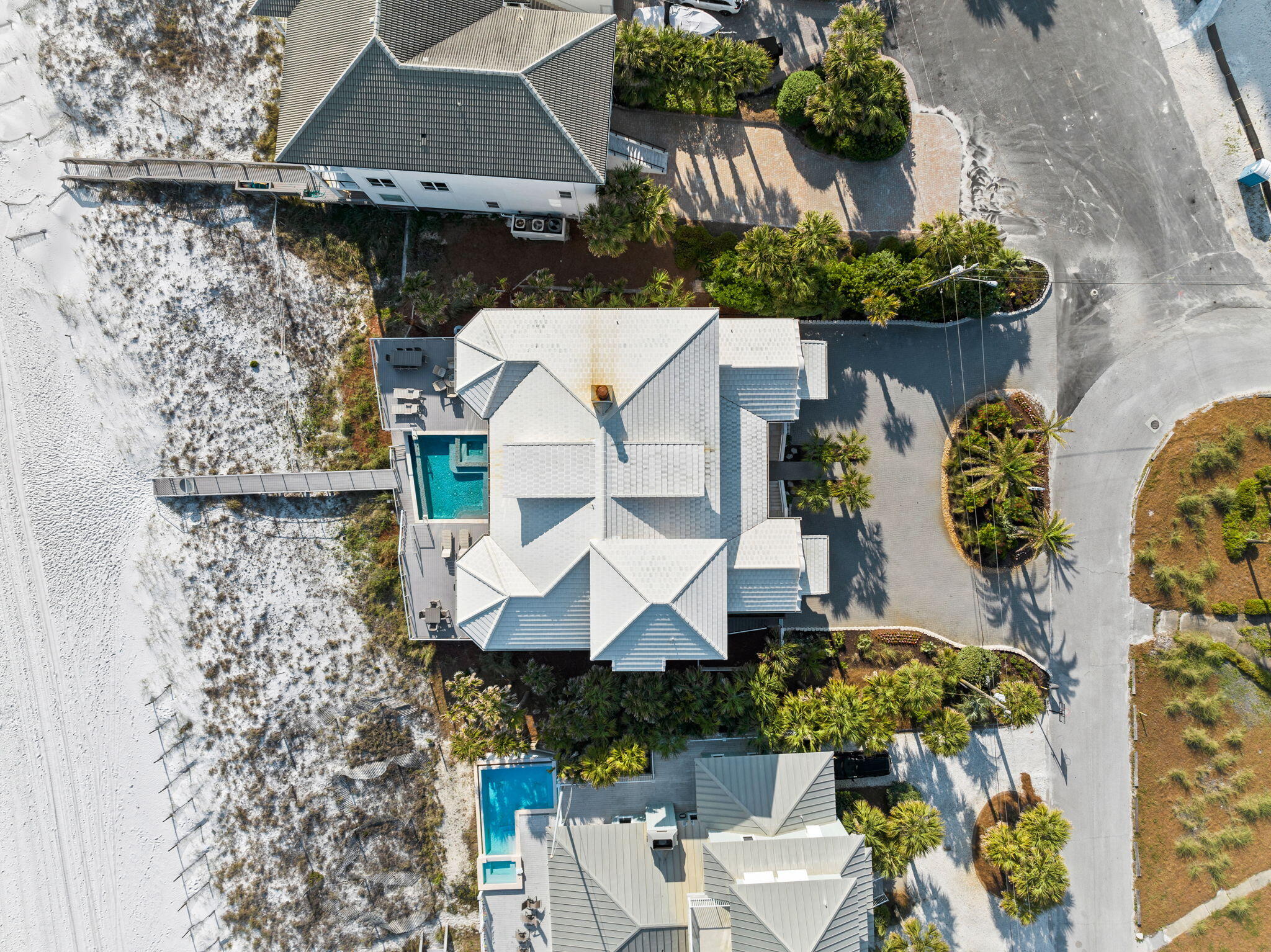 138 West Beach Drive Miramar Beach, FL 32550 - Photo 62 of 72 an aerial view of a house with a yard