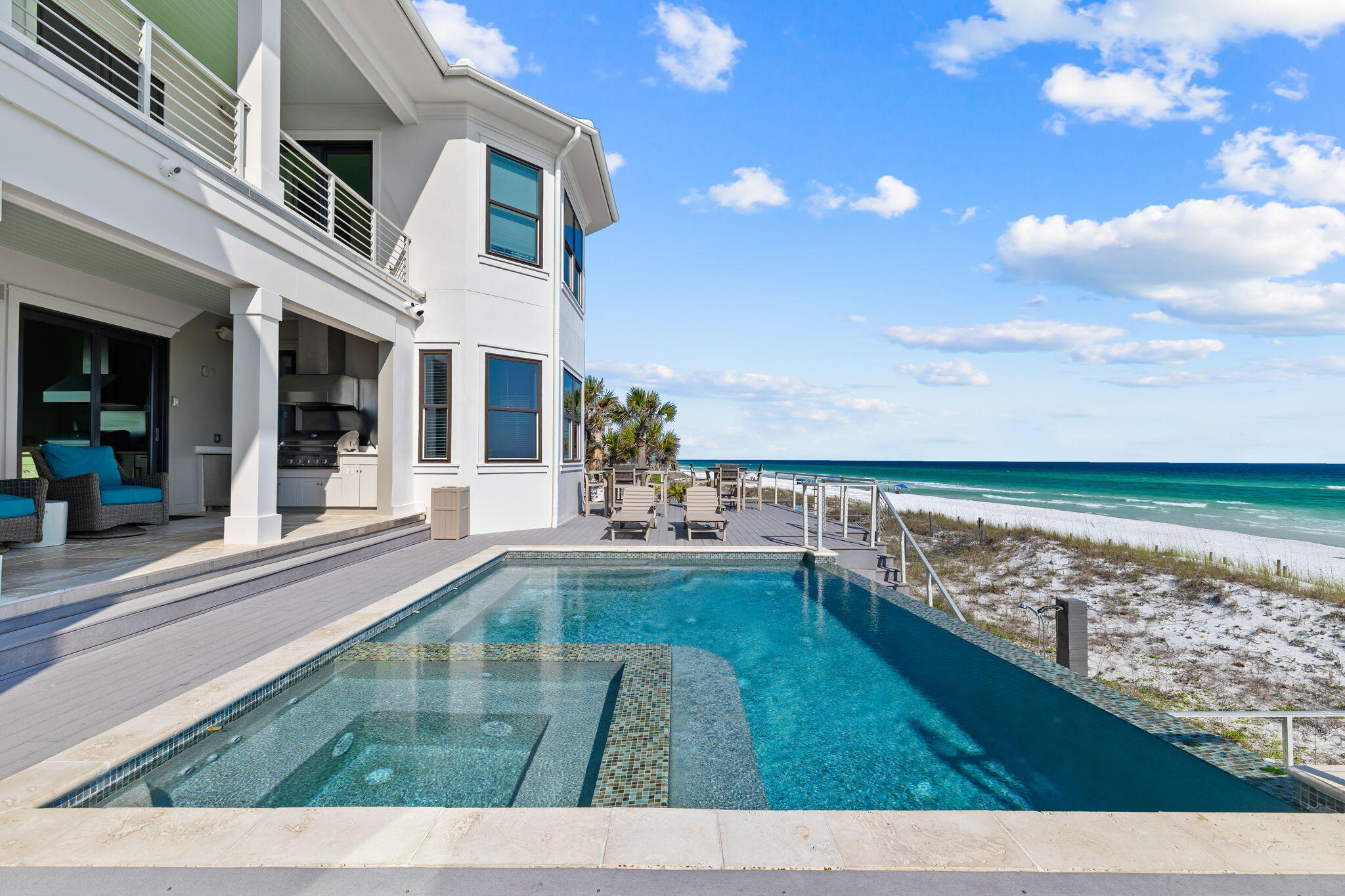 138 West Beach Drive Miramar Beach, FL 32550 - Photo 66 of 72 a view of an swimming pool with an outdoor seating