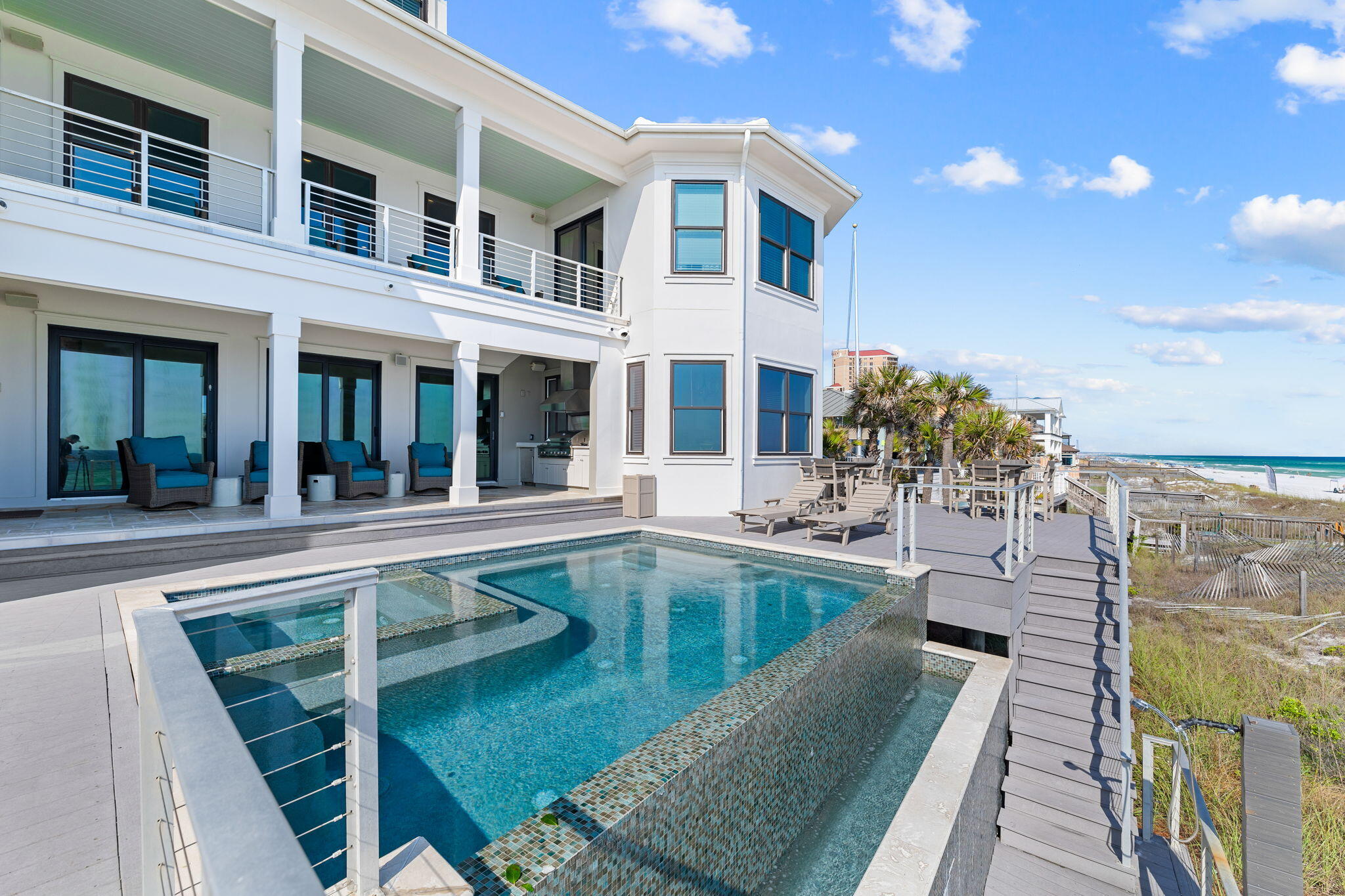 138 West Beach Drive Miramar Beach, FL 32550 - Photo 67 of 72 a view of a swimming pool with outdoor seating