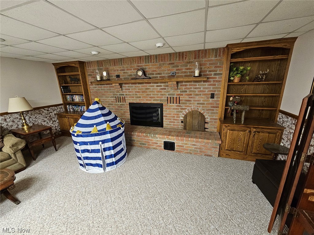 8215 Rochester Road East Rochester, OH 44625 - Photo 29 of 34 Basement fireplace