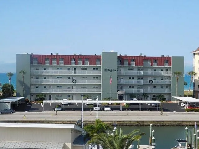 a view of tall buildings and a lake view
