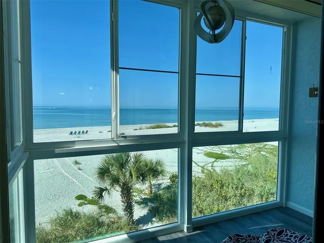 a view of a door and a window