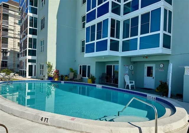 a view of a house with a swimming pool