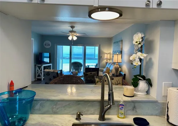 a room with furniture and a chandelier