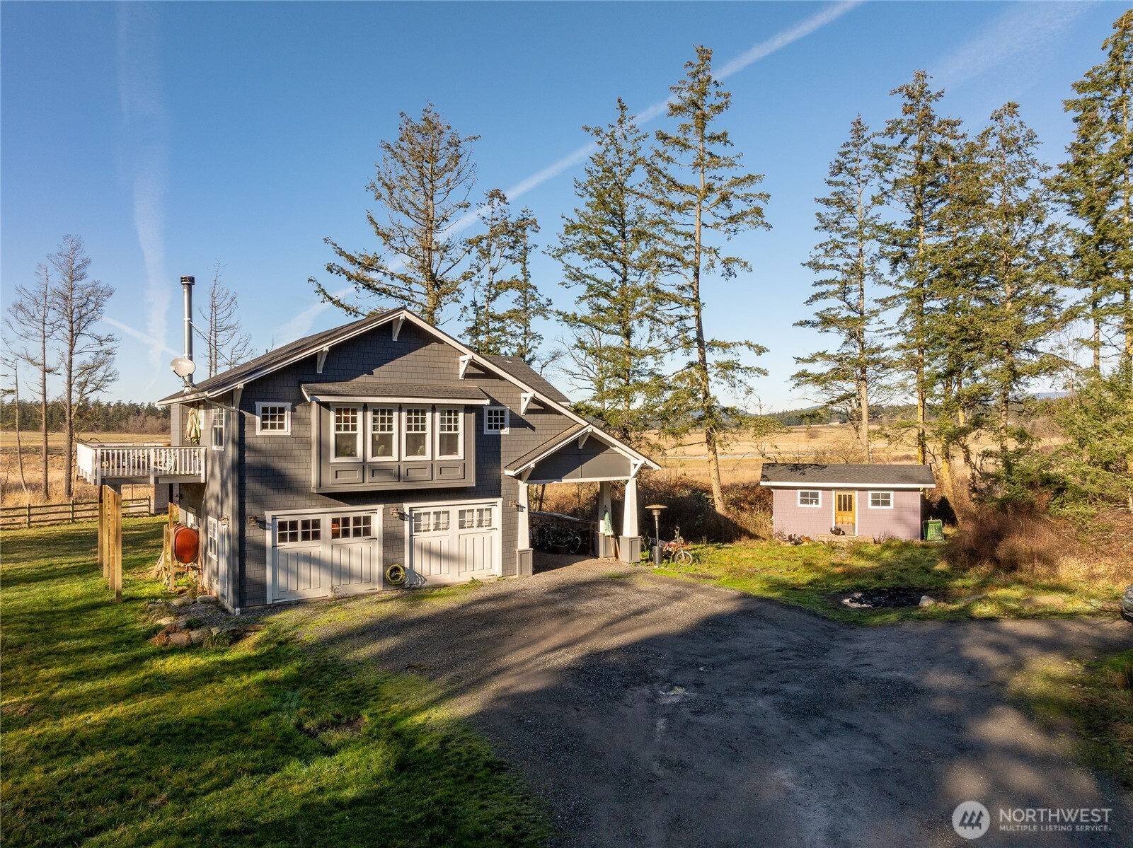 1372 Bakerview Road Lopez Island, WA 98261 - Photo 5 of 22 a house view with a outdoor space
