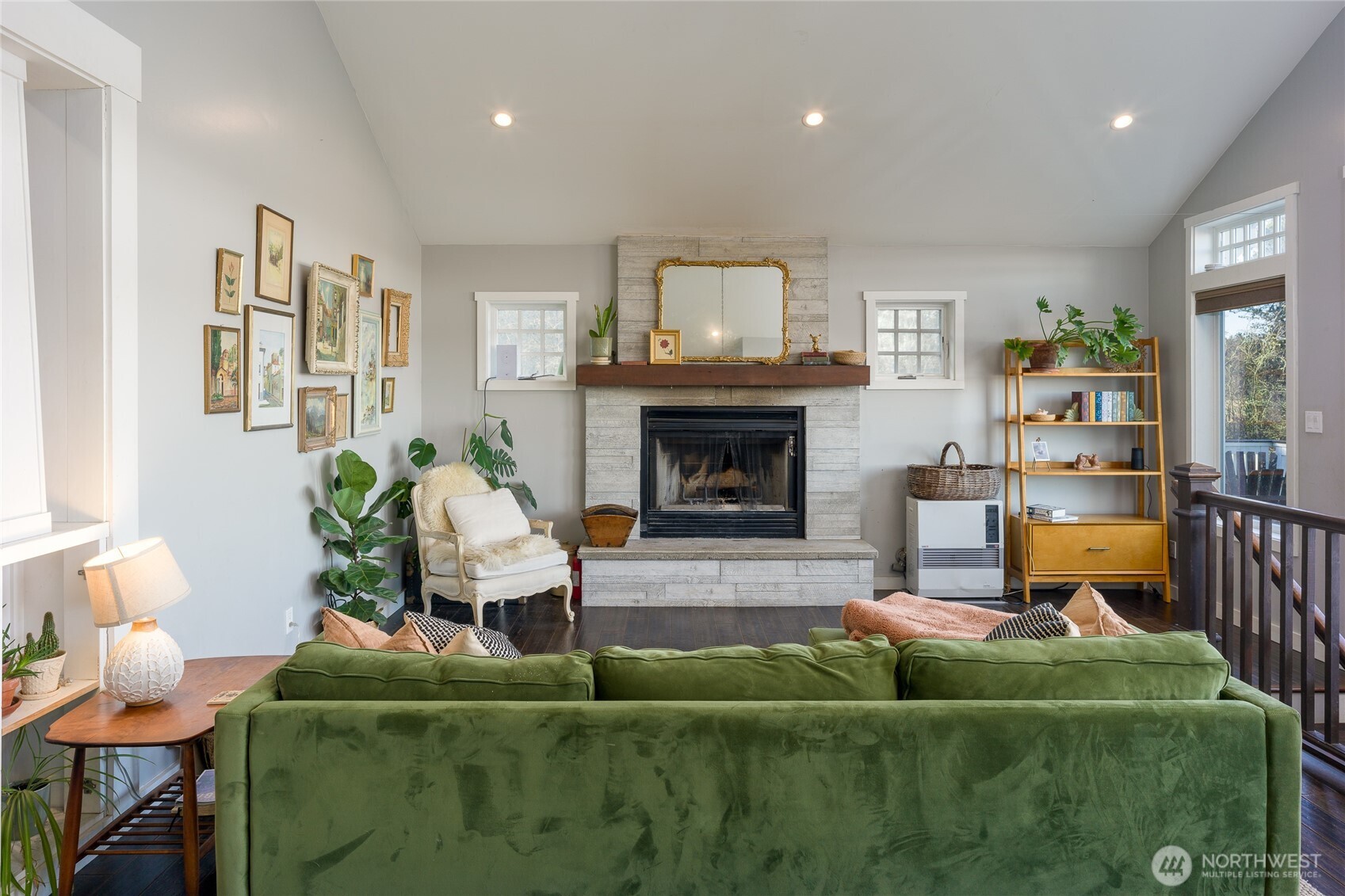 1372 Bakerview Road Lopez Island, WA 98261 - Photo 7 of 22 a living room with furniture and a fireplace