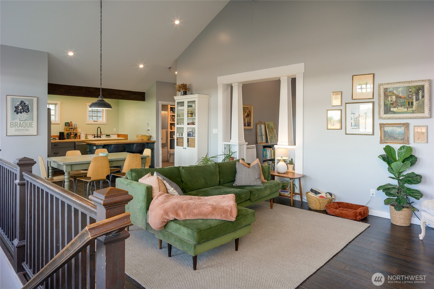 1372 Bakerview Road Lopez Island, WA 98261 - Photo 8 of 22 a living room with furniture kitchen view and a potted plant