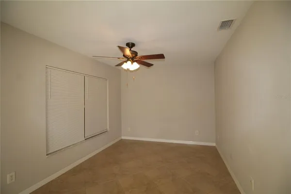 a view of a livingroom with a ceiling fan