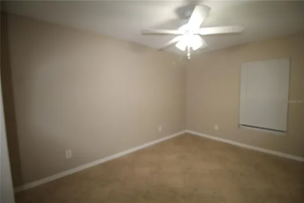 a view of a small space with a fan