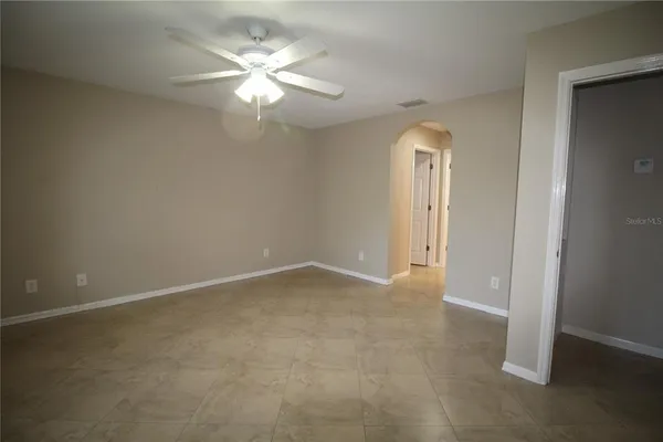 an empty room that has a window