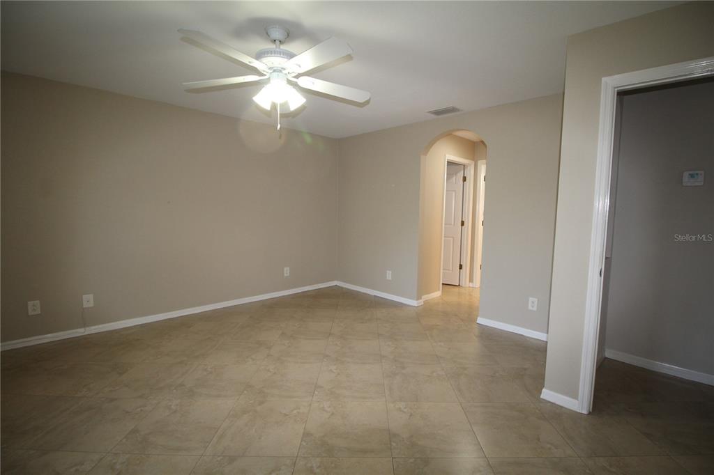 5508 Douglas Road North Port, FL 34288 - Photo 10 of 12 an empty room that has a window