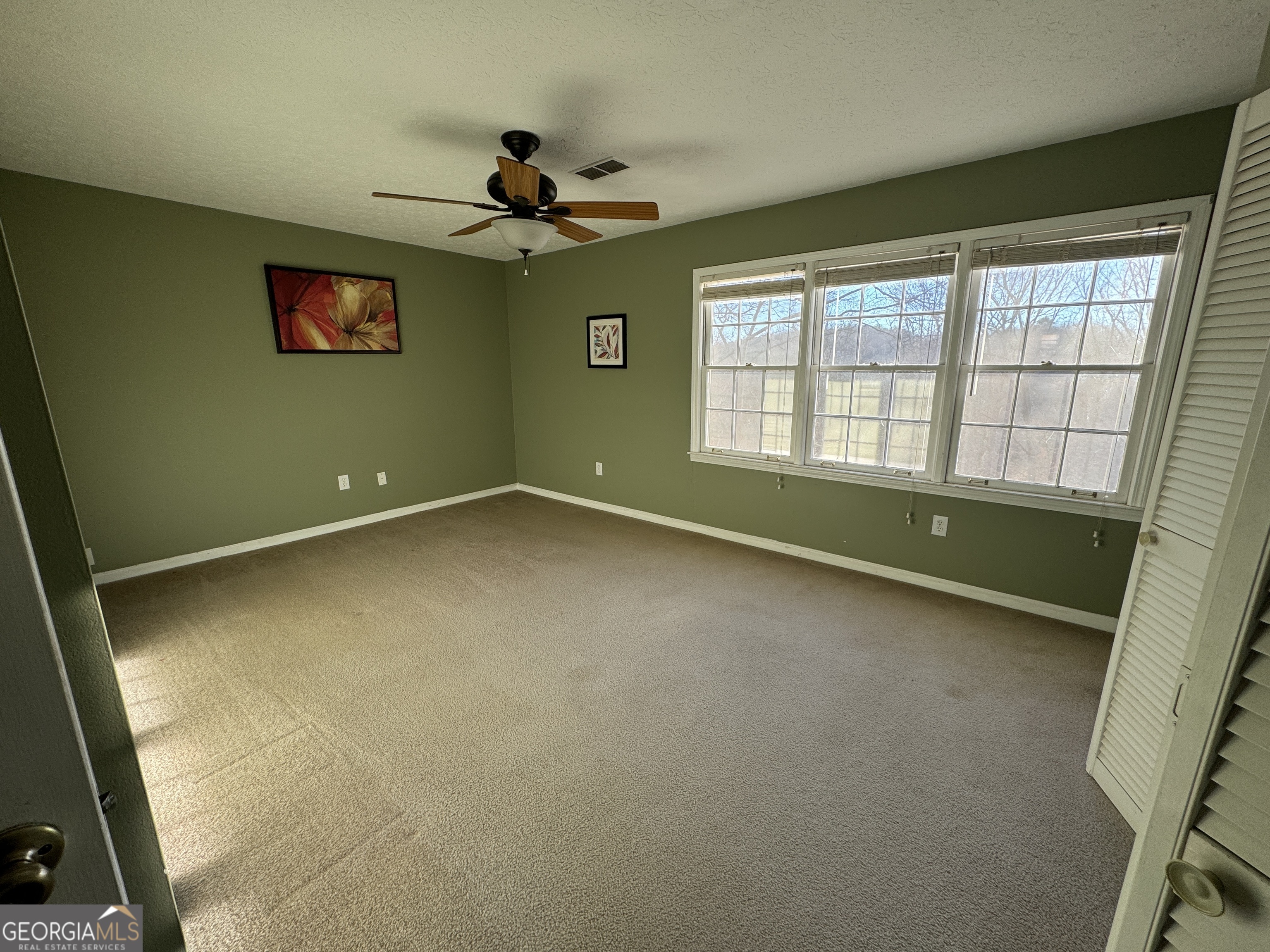 345 Caldwell Circle Athens, GA 30605 - Photo 27 of 38 a view of an empty room with a window