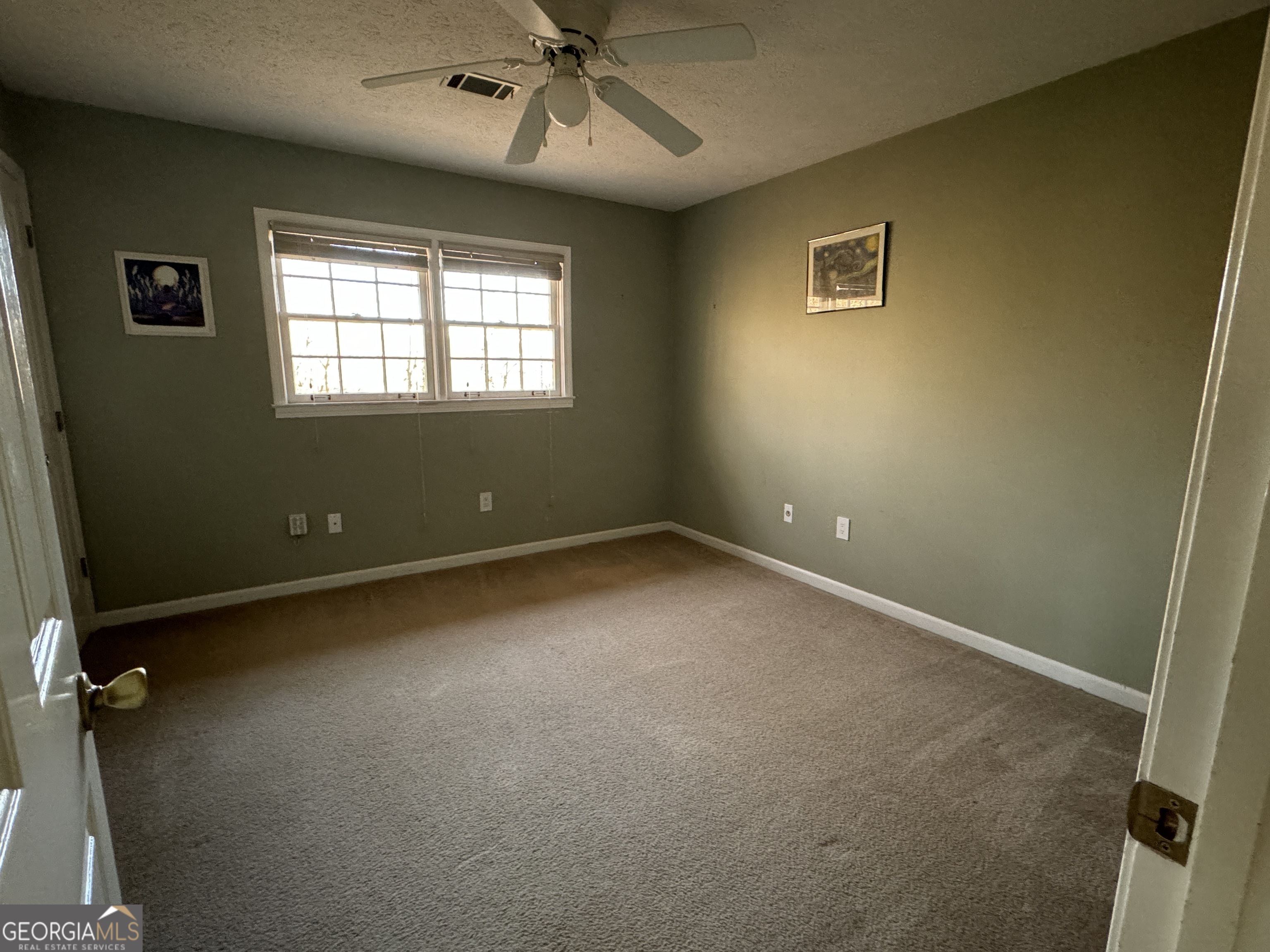 345 Caldwell Circle Athens, GA 30605 - Photo 29 of 38 an empty room with a window