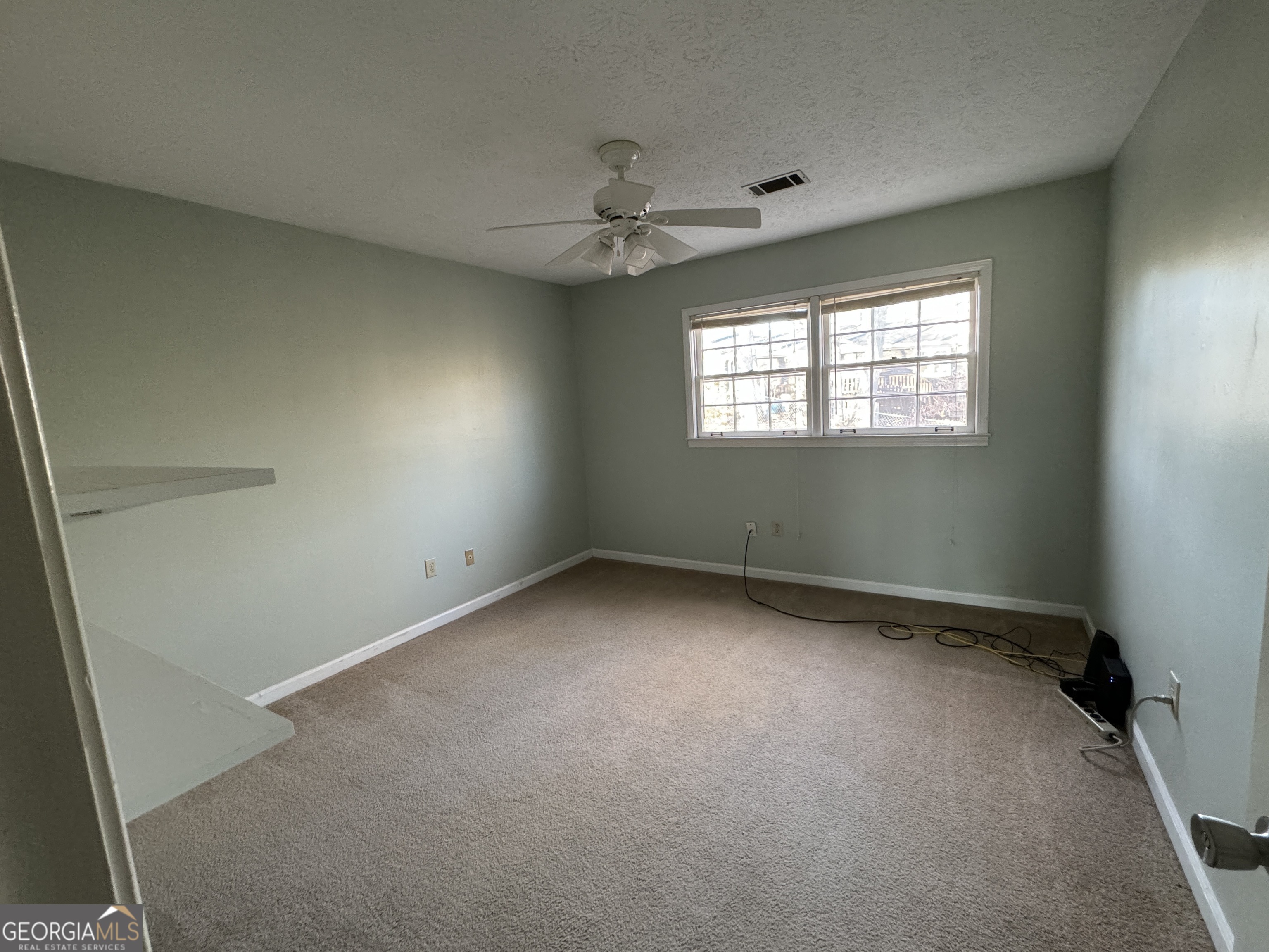 345 Caldwell Circle Athens, GA 30605 - Photo 31 of 38 an empty room with a window