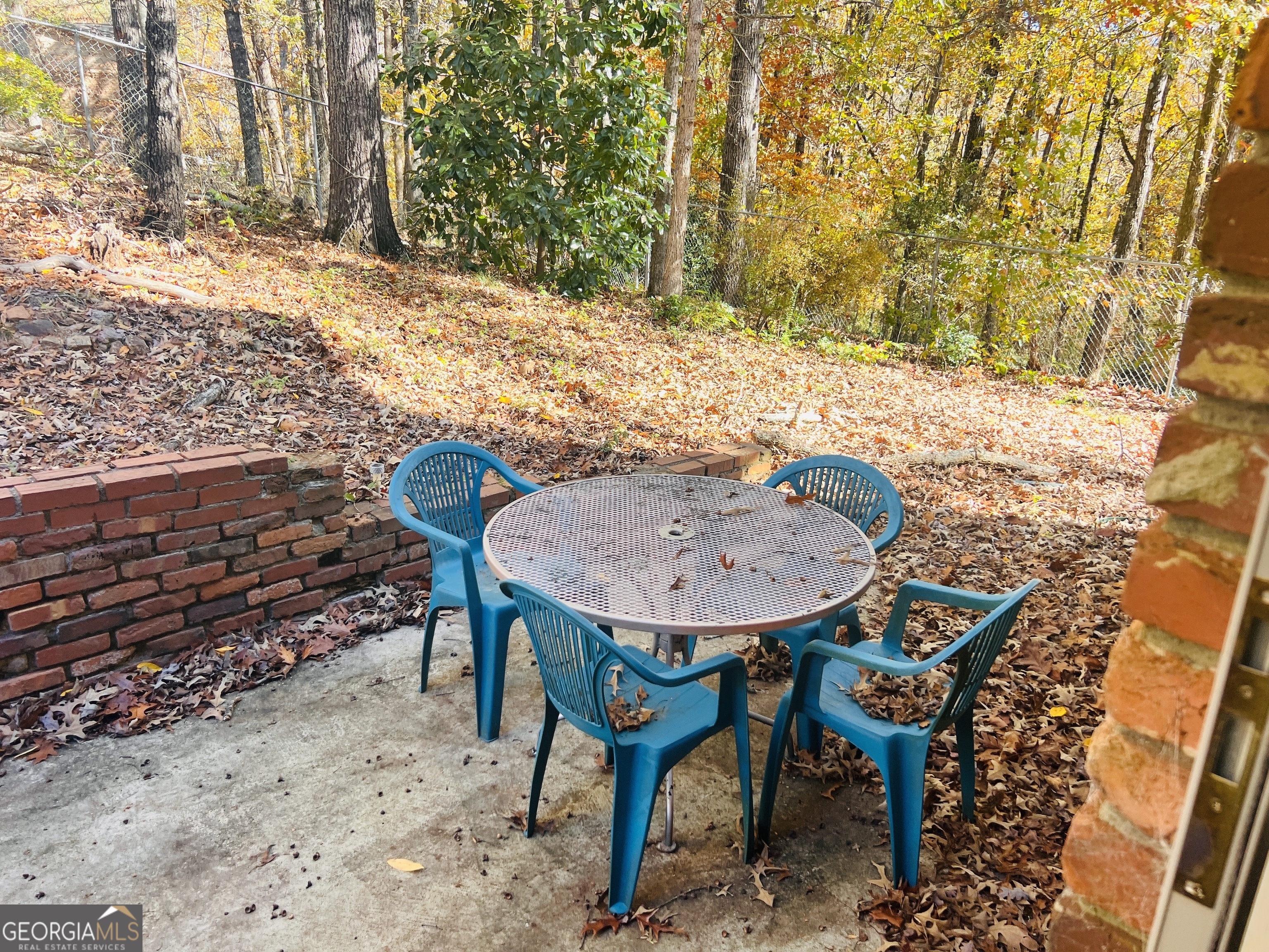 345 Caldwell Circle Athens, GA 30605 - Photo 8 of 38 a view of a chairs and table in the backyard